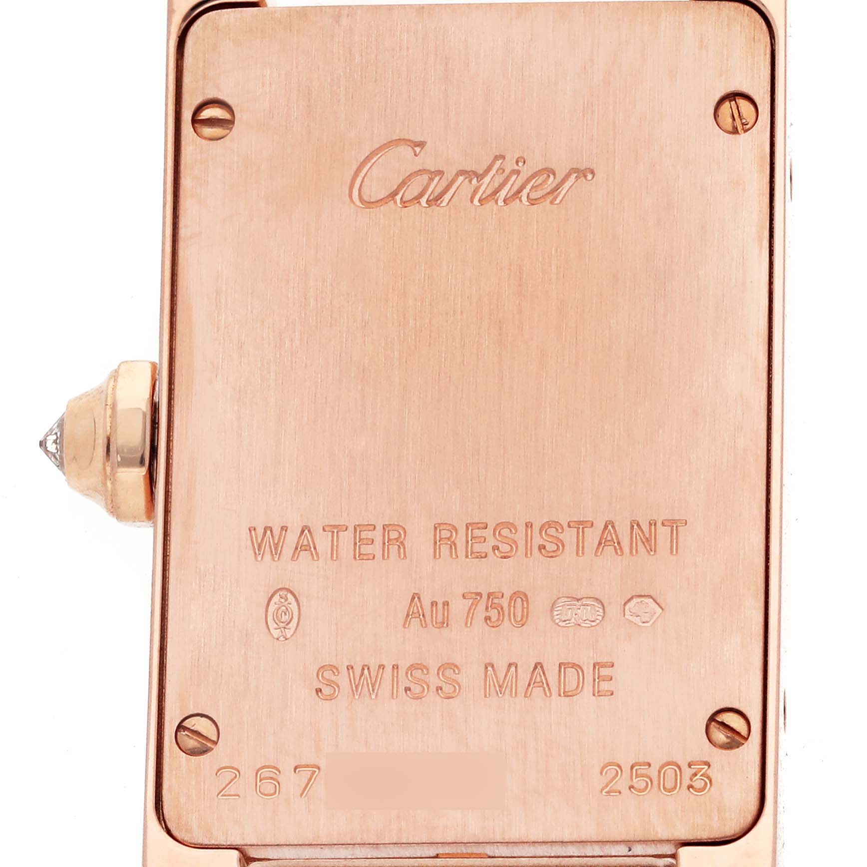 The image shows the back case of a Cartier Tank Americaine WB710008 Women's Rose Gold Silver Dial WB710008 Women's Rose Gold Silver Dial watch, highlighting engravings and the crown.