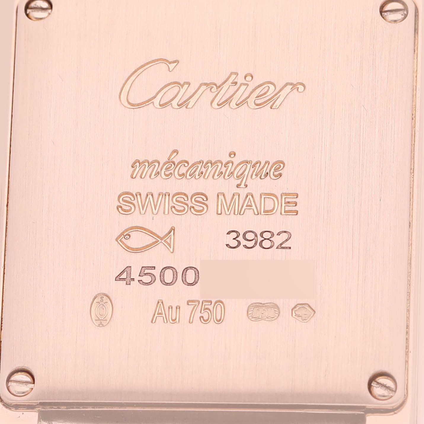 This image shows the case back of a Cartier Tank Louis WGTA0010 Women's Rose Gold Silver Dial WGTA0010 Women's Rose Gold Silver Dial model watch, displaying inscriptions and hallmarks.