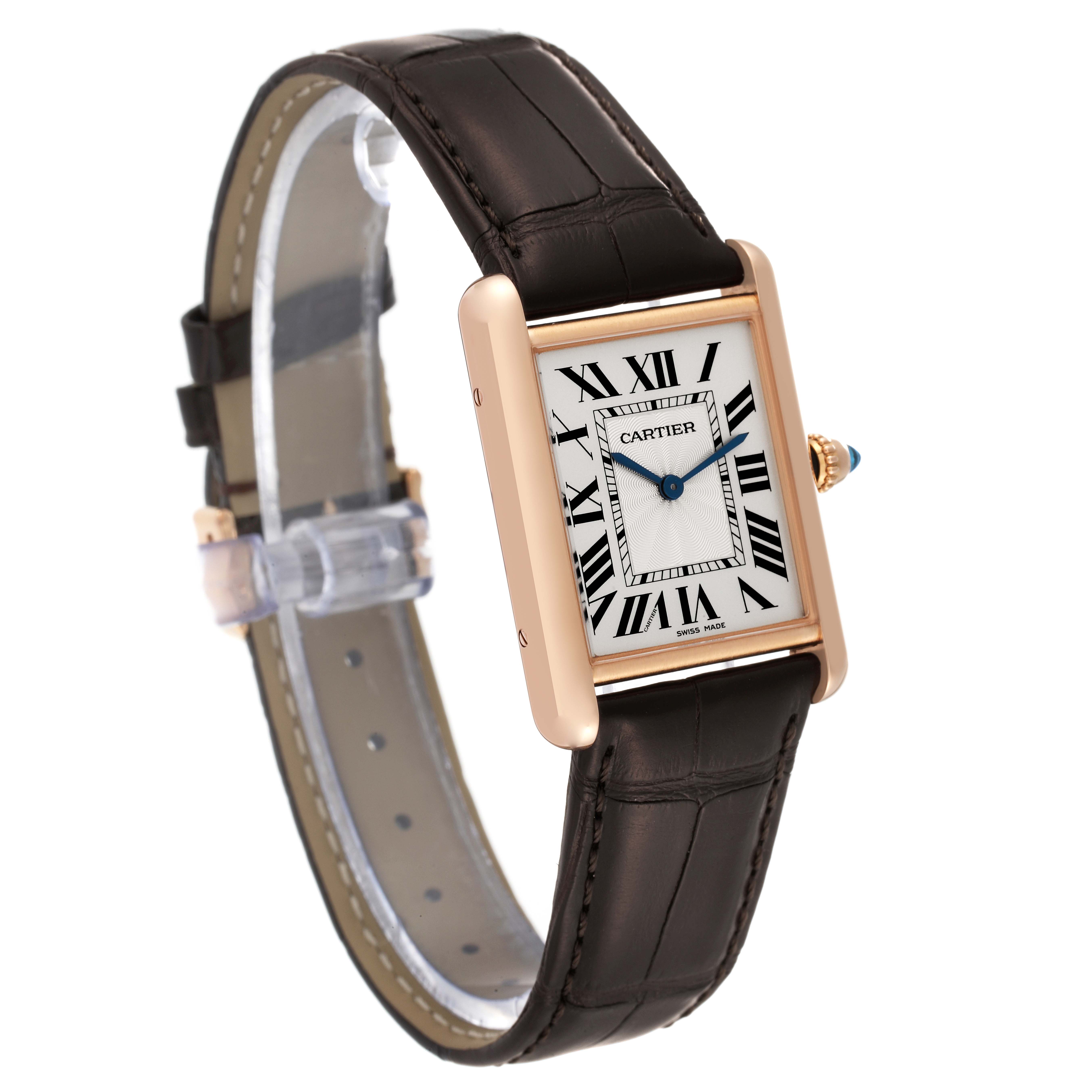 The image shows a Tank Louis Cartier watch in a angled view, highlighting its rectangular face and leather strap.