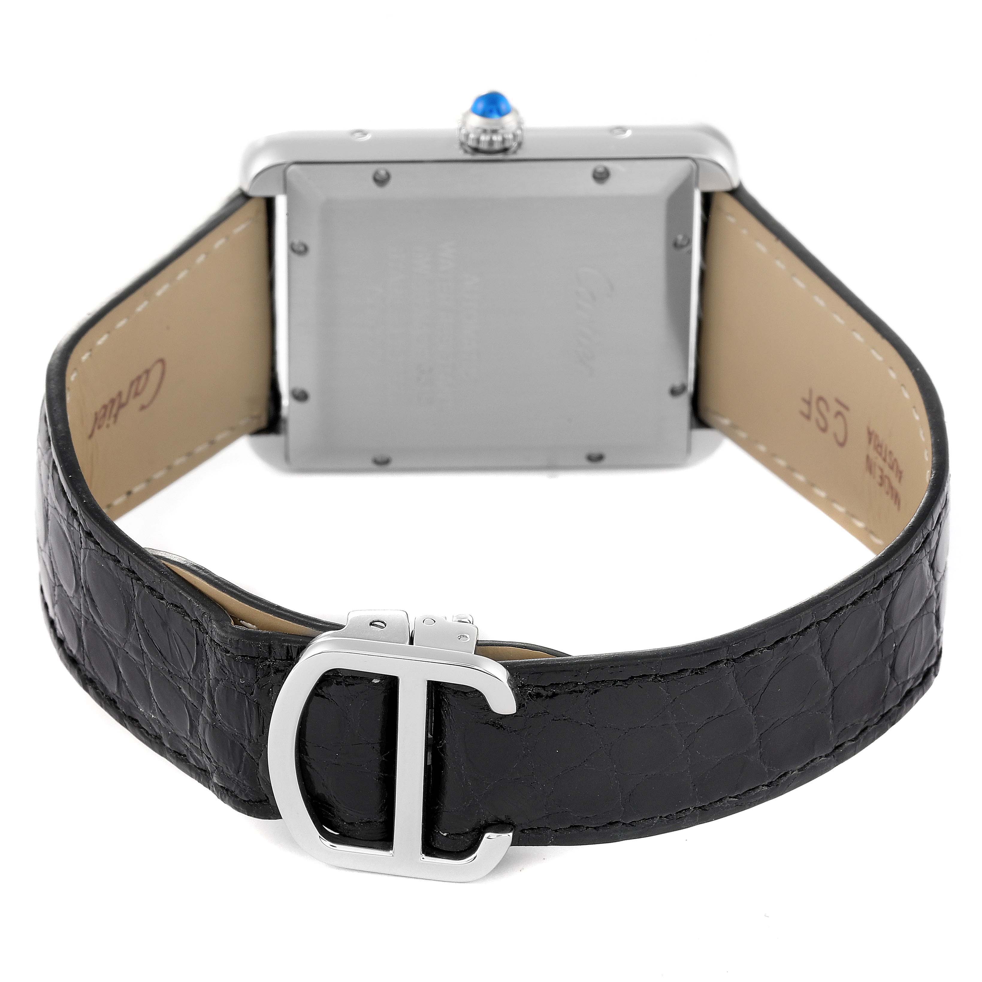 The image shows the back and clasp of the Cartier Tank Solo W5200027 Men
s Stainless Steel Silver Dial W5200027 Men
s Stainless Steel Silver Dial watch with a black leather strap and a silver buckle.