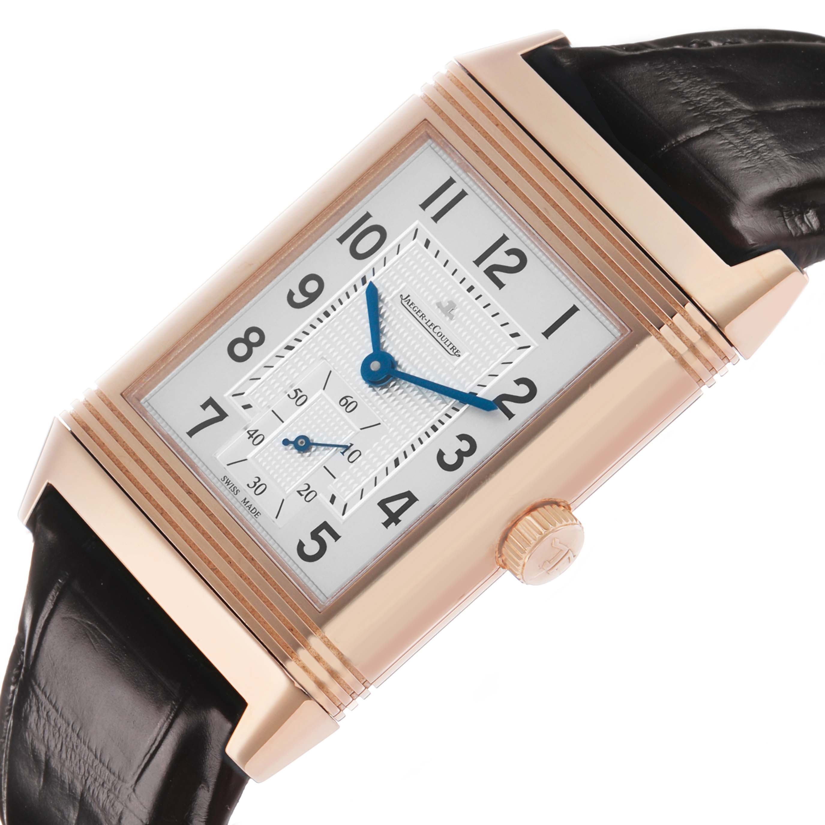 The Jaeger LeCoultre Reverso Q3732420 Men's Rose Gold Silver Dial watch is shown at an angle highlighting its rectangular face, crown, and leather strap.