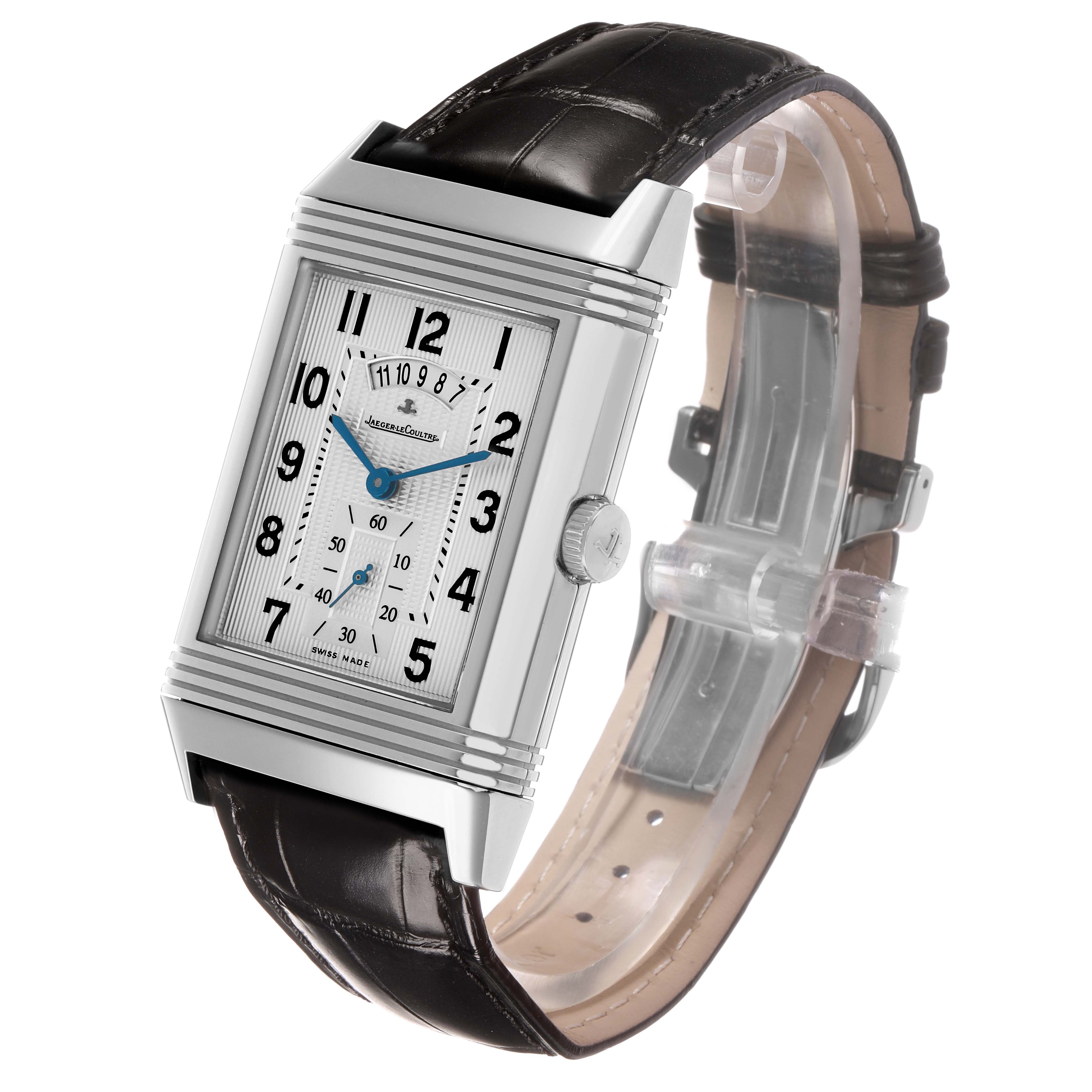 The Jaeger-LeCoultre Reverso watch is shown at a three-quarter angle, displaying the rectangular dial, case, crown, and leather strap.