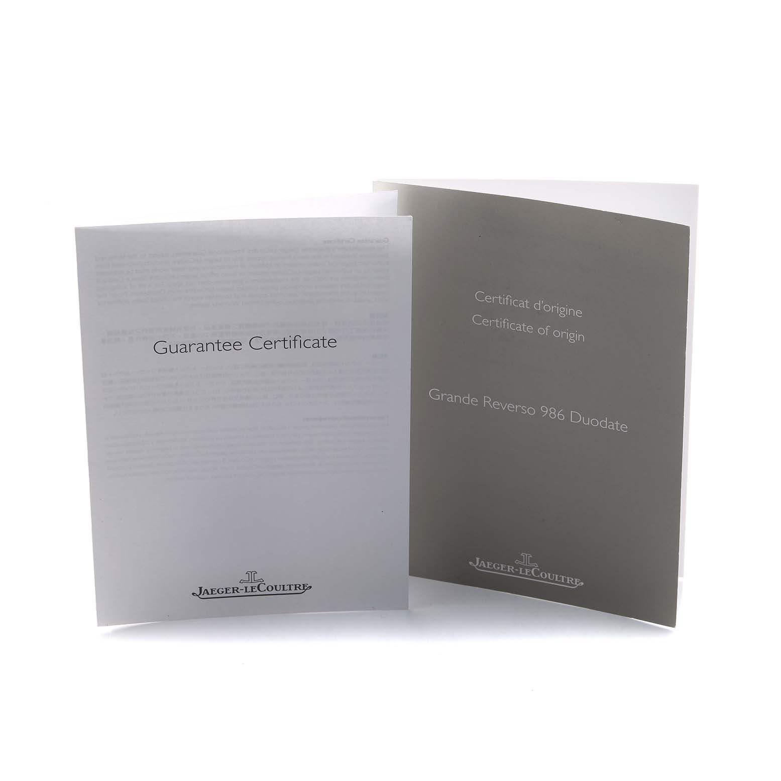 The image shows two certificates for the Jaeger-LeCoultre Grande Reverso 986 Duodate, one for guarantee and one for origin.