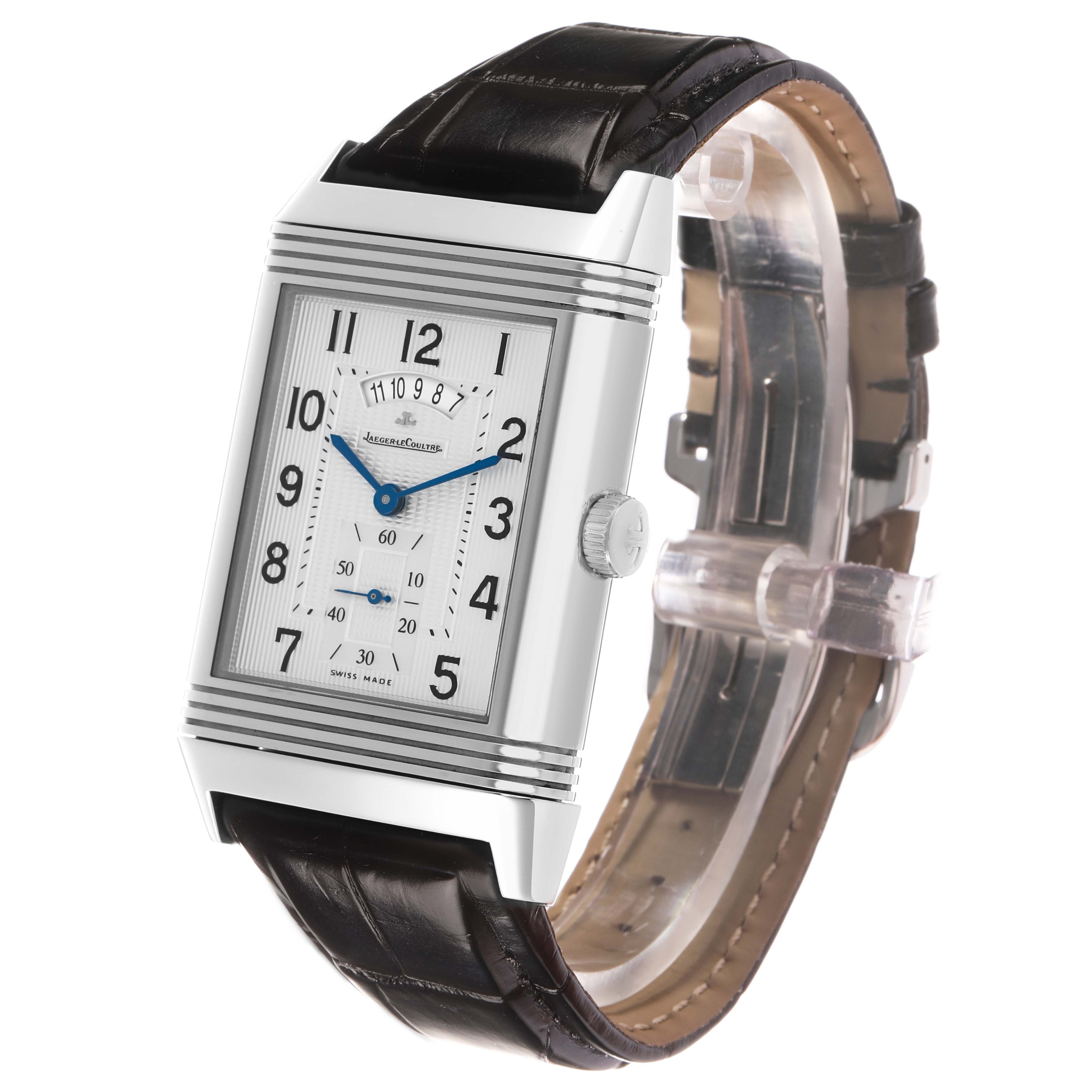 The Jaeger-LeCoultre Reverso watch is shown at a front angle, highlighting its rectangular dial, crown, and leather strap.