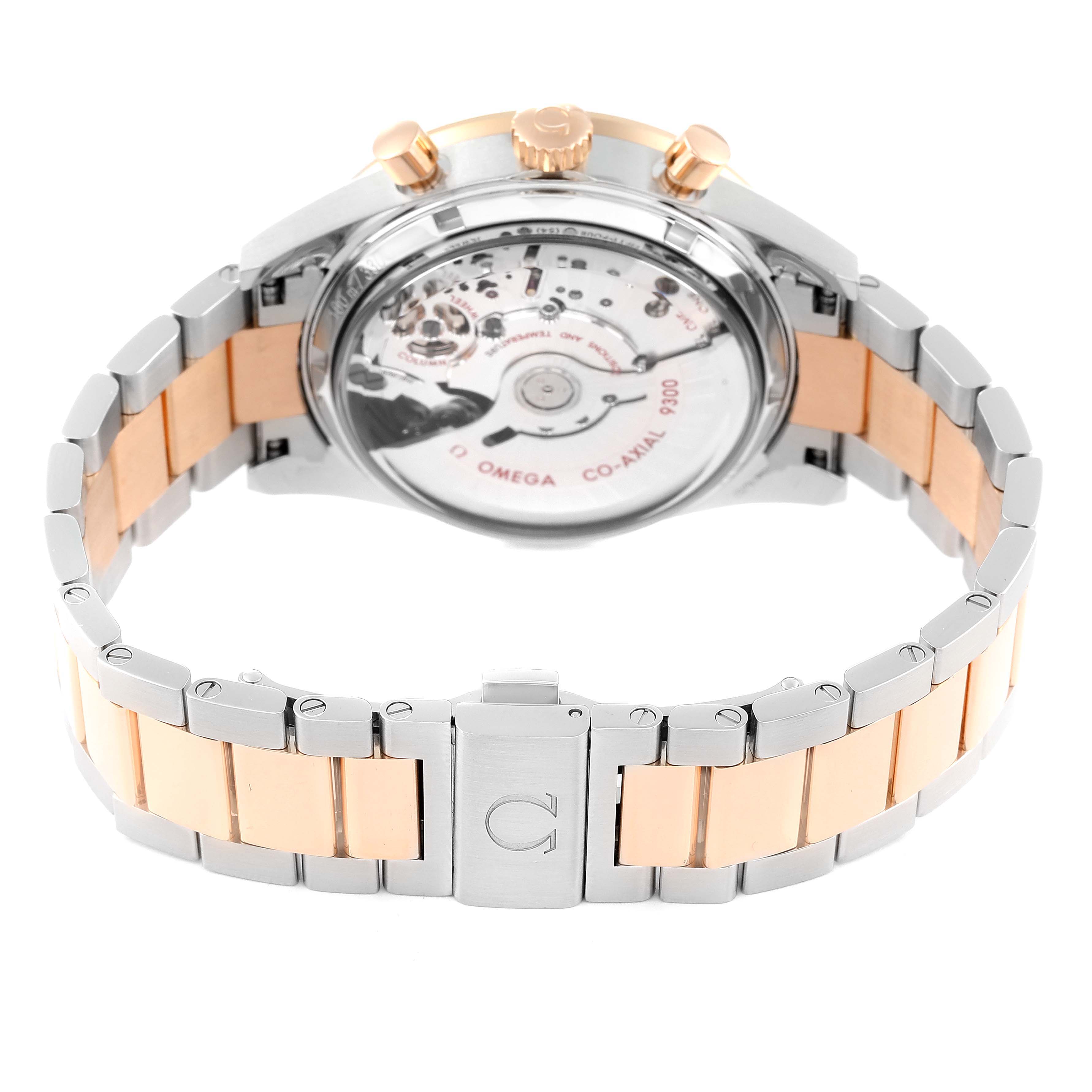 The image shows the back view of the Omega Speedmaster 331.20.42.51.01.002 Men's Steel and Gold (two tone) Black Dial 331.20.42.51.01.002 Men's Steel and Gold (two tone) Black Dial watch, highlighting its transparent case back and bi-colored metal bracelet.