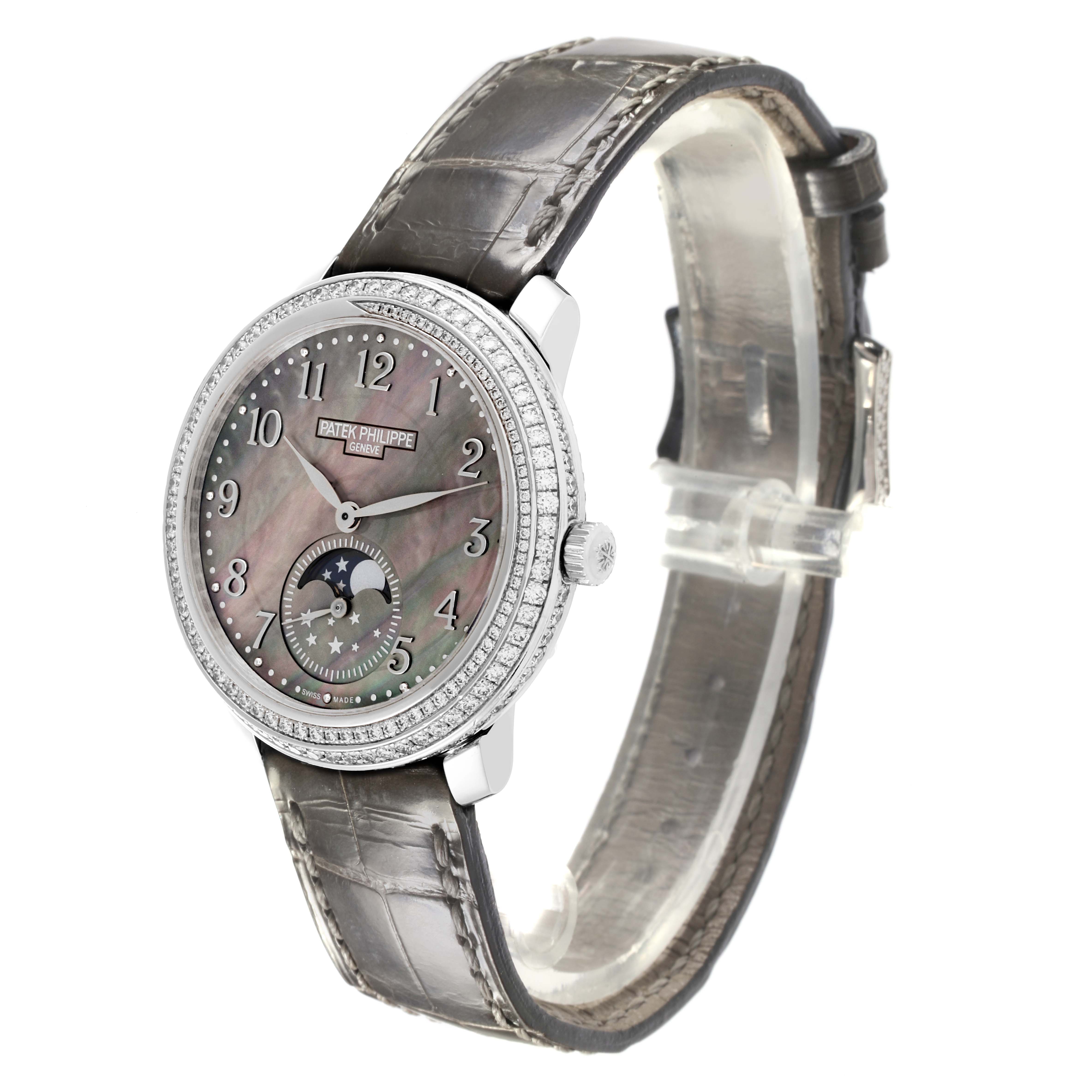 The Patek Philippe Complications 4968G-001 Women's White Gold Mother of Pearl Dial 4968G-001 Women's White Gold Mother of Pearl Dial is shown at a three-quarter angle, highlighting the face, bezel, and strap.