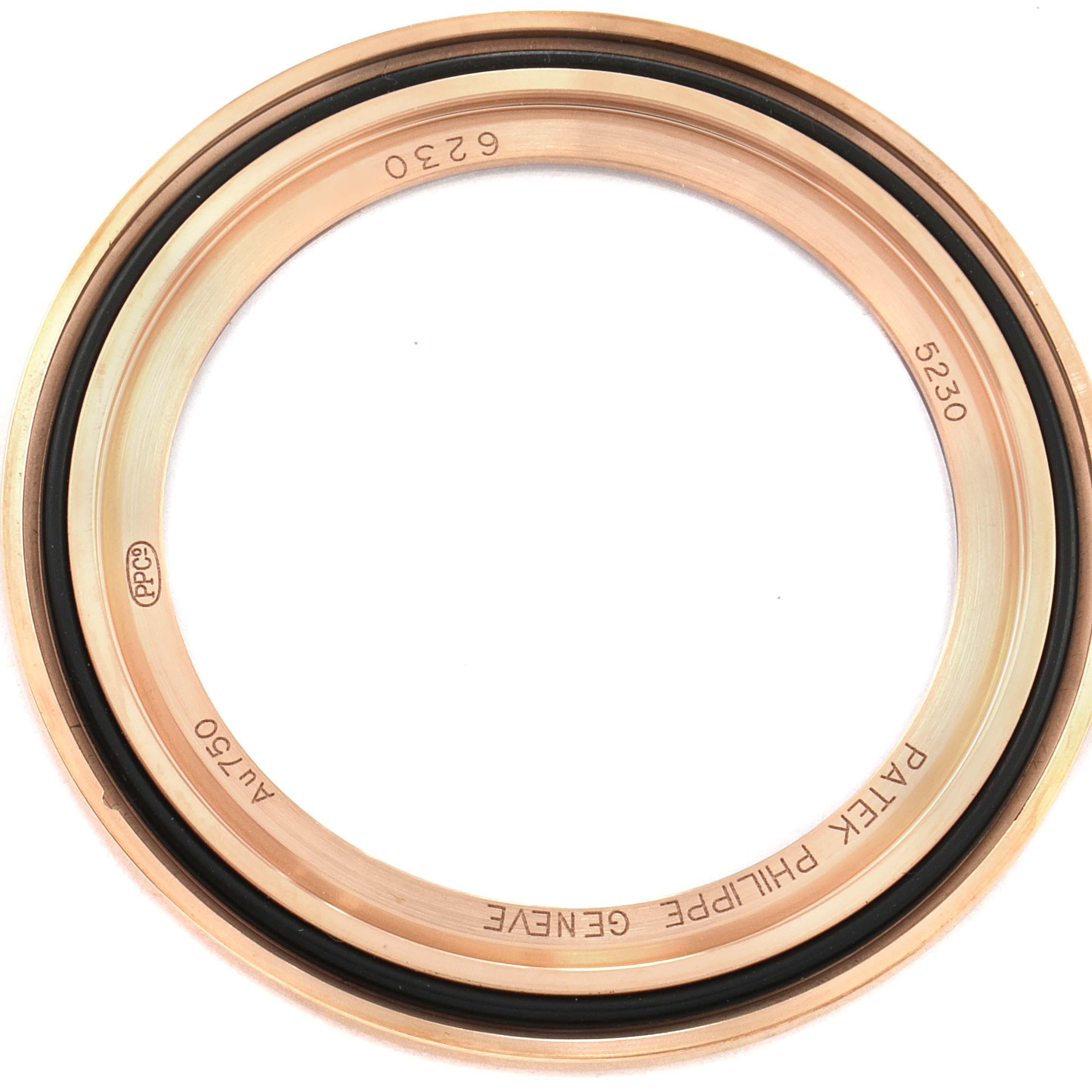 This image shows the bezel of a Patek Philippe Complications 5230R Men's Rose Gold Grey Dial 5230R Men's Rose Gold Grey Dial model, featuring inner engravings and an O-ring.