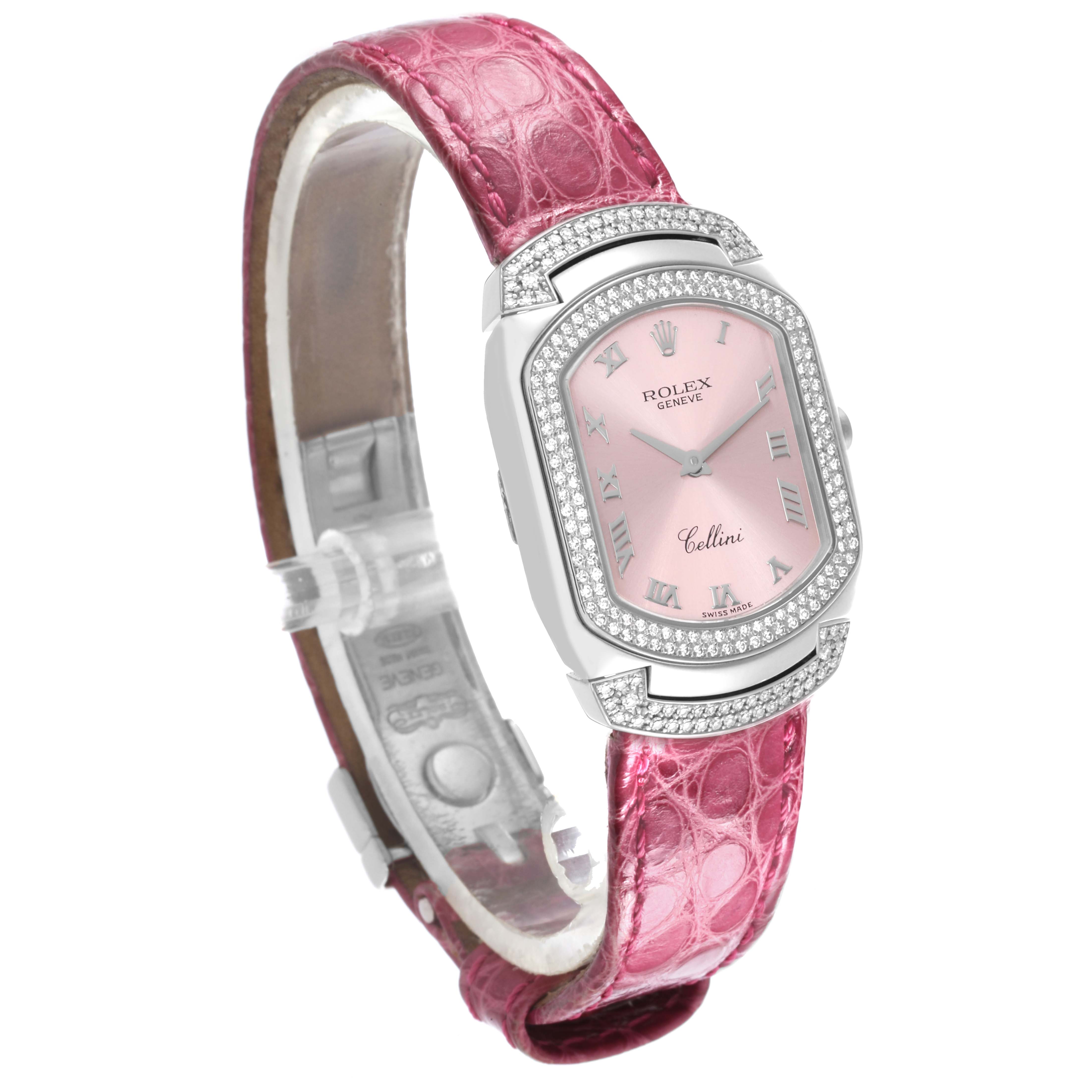 The Rolex Cellini 6693 Women's White Gold Pink Dial 6693 Women's White Gold Pink Dial watch is shown at a slight angle, displaying the face, bezel, and the pink leather strap.