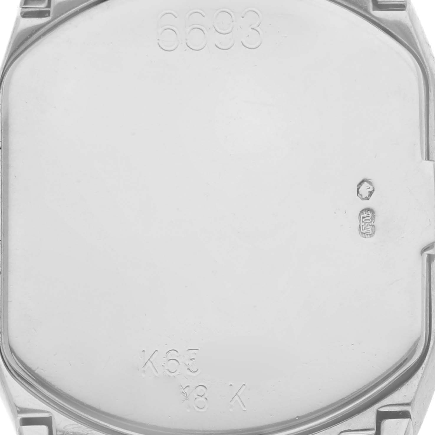 The image shows the back case of a Rolex Cellini 6693 Women's White Gold Pink Dial 6693 Women's White Gold Pink Dial watch, displaying reference numbers and hallmarks.