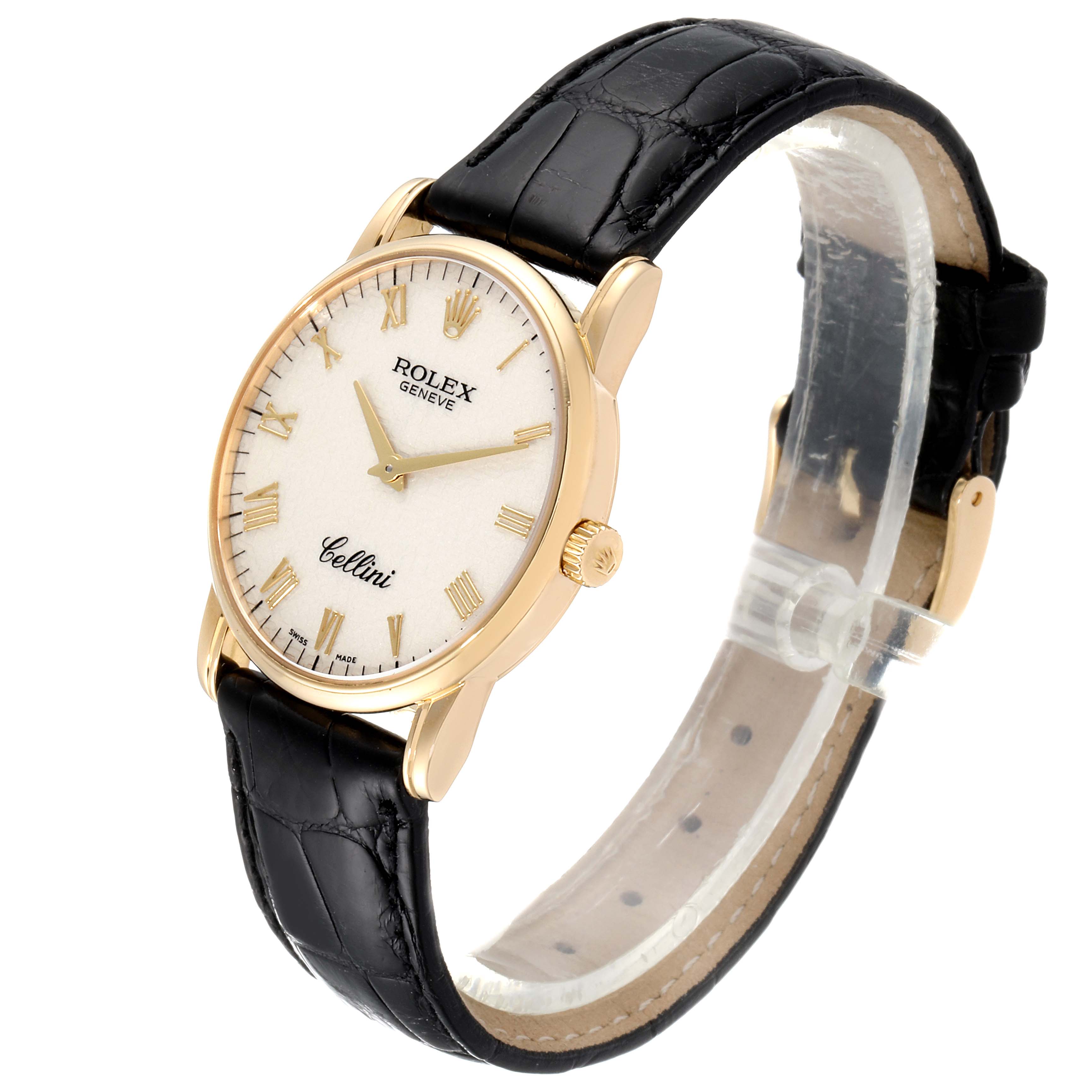 This image shows a Rolex Cellini 5116/8 Men's Yellow Gold Beige Dial 5116/8 Men's Yellow Gold Beige Dial watch angled to display the face, gold case, crown, and black leather strap.