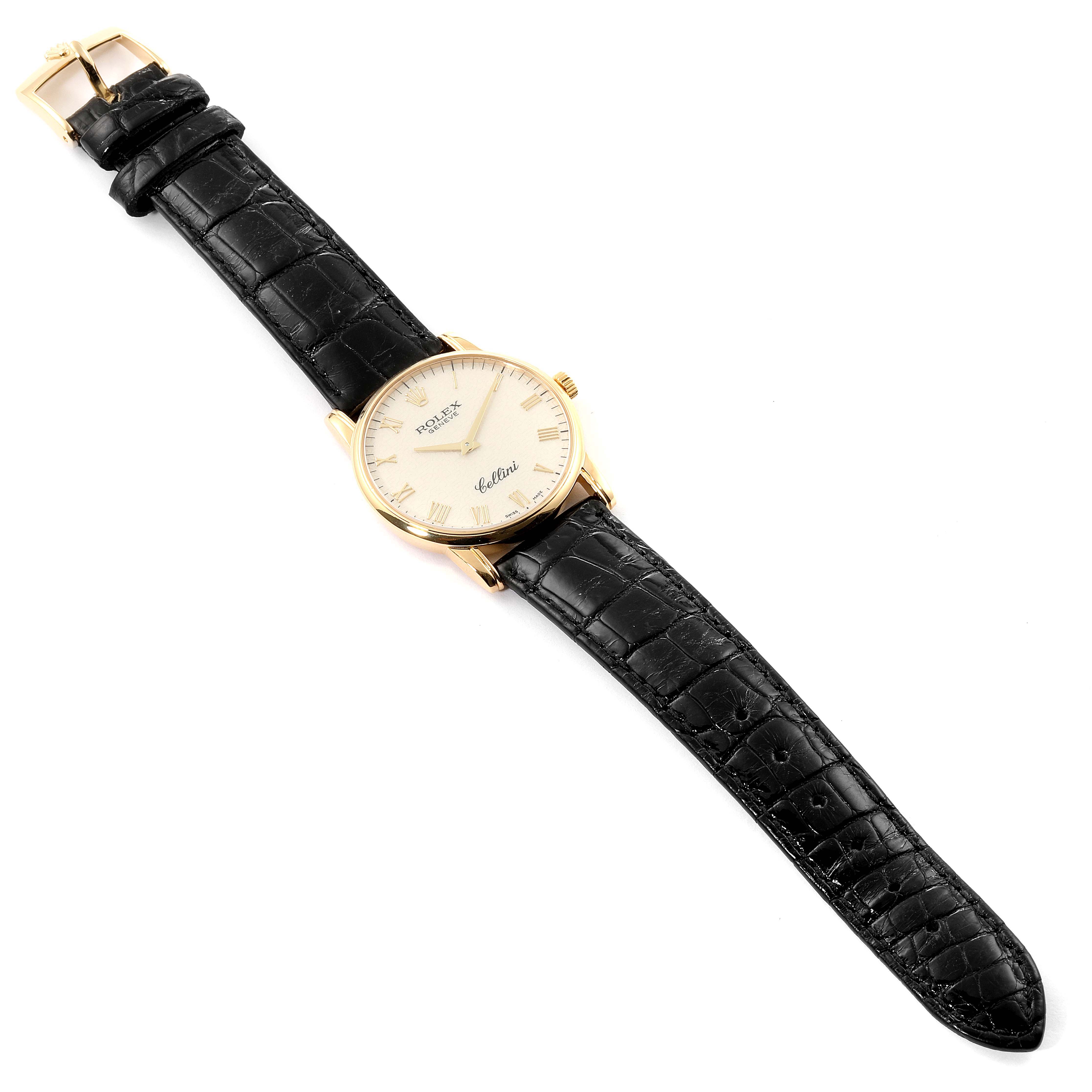The image shows a Rolex Cellini 5116/8 Men's Yellow Gold Beige Dial 5116/8 Men's Yellow Gold Beige Dial watch lying flat, featuring its face, black leather strap, and gold buckle.