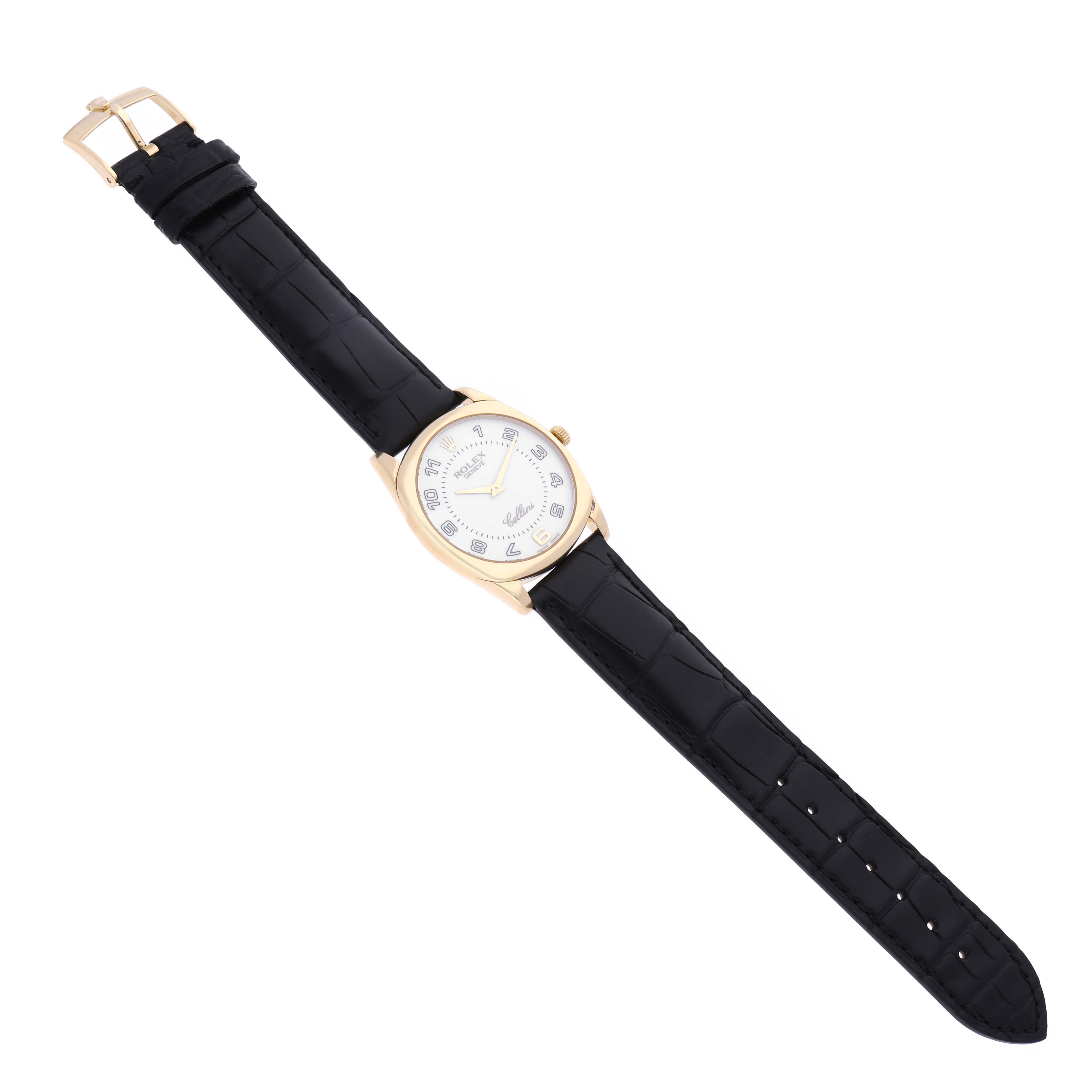 The Rolex Cellini 4233 Men's Yellow Gold White Dial 4233 Men's Yellow Gold White Dial watch is shown at a top-down angle, displaying the face, case, and entire leather strap.