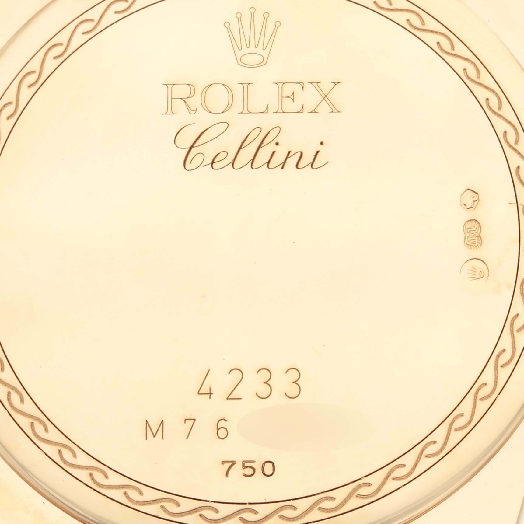 This image shows a close-up of the dial of a Rolex Cellini 4233 Men's Yellow Gold White Dial 4233 Men's Yellow Gold White Dial watch, highlighting the brand logo and model details.