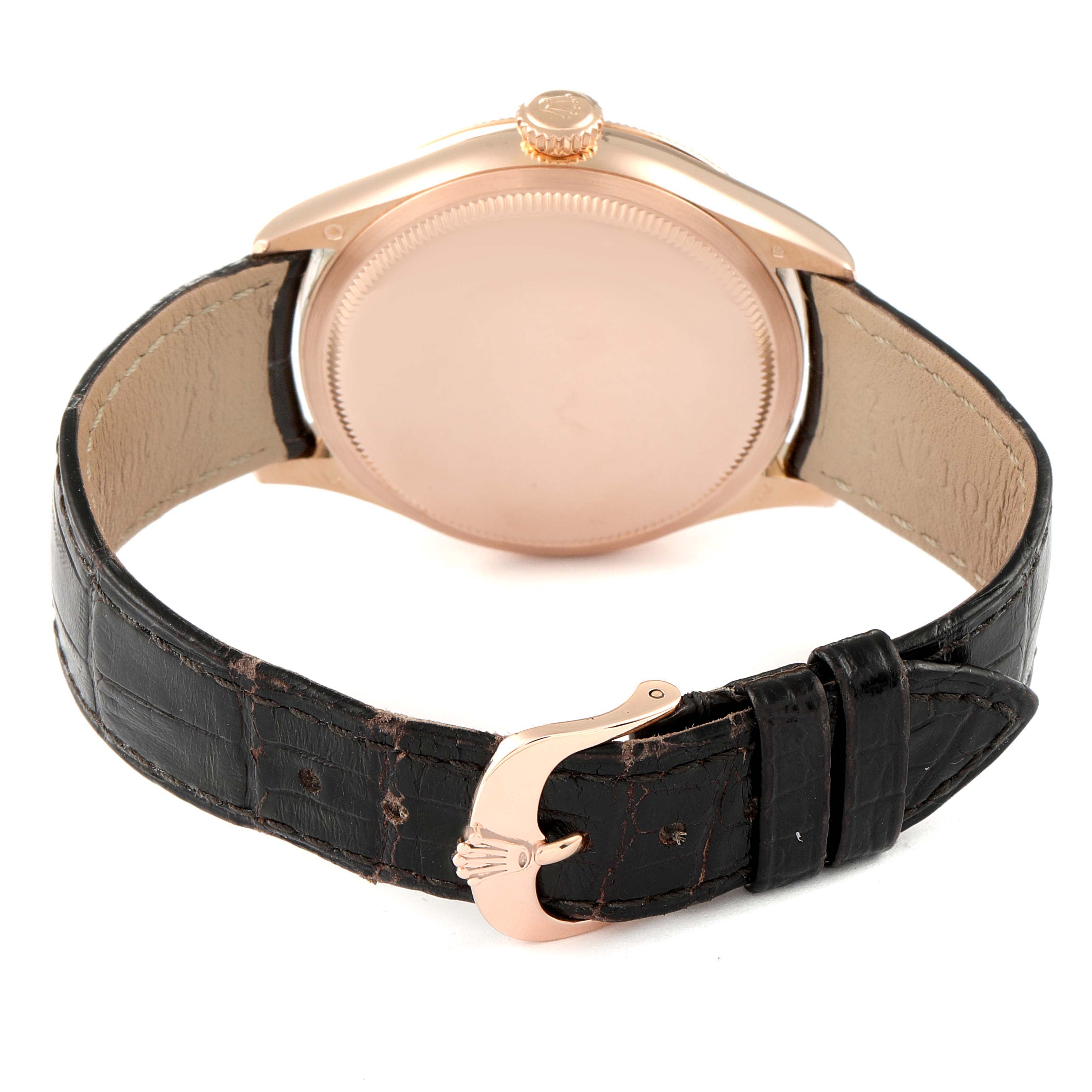 The image shows the back view of a Rolex Cellini 50505 Men's Rose Gold White Dial 50505 Men's Rose Gold White Dial watch, highlighting its case back, crown, and leather strap with buckle.