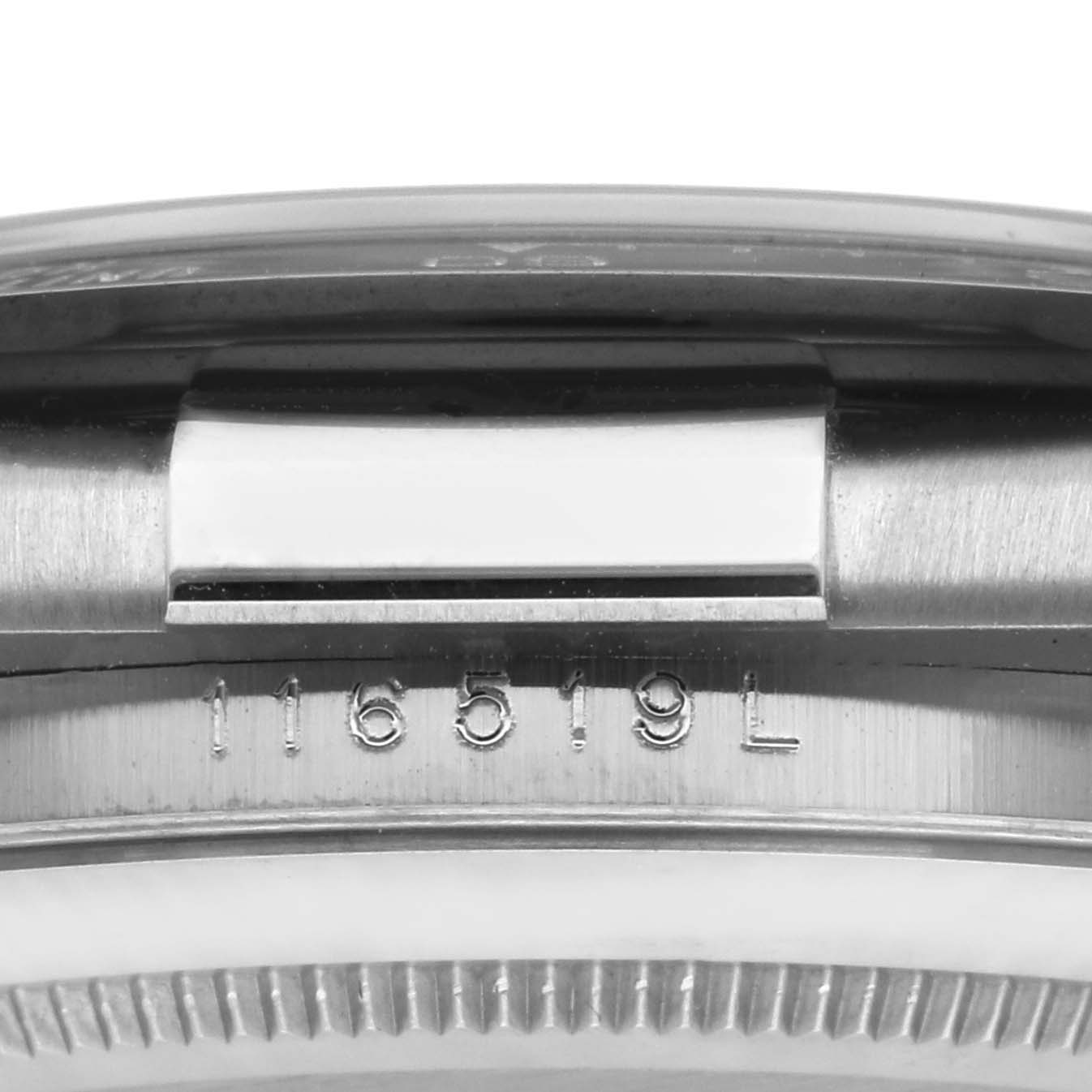 The image shows a close-up of the Rolex Daytona 116519LN Men's White Gold Grey Dial 116519LN Men's White Gold Grey Dial model's case side, featuring the watch's serial number.