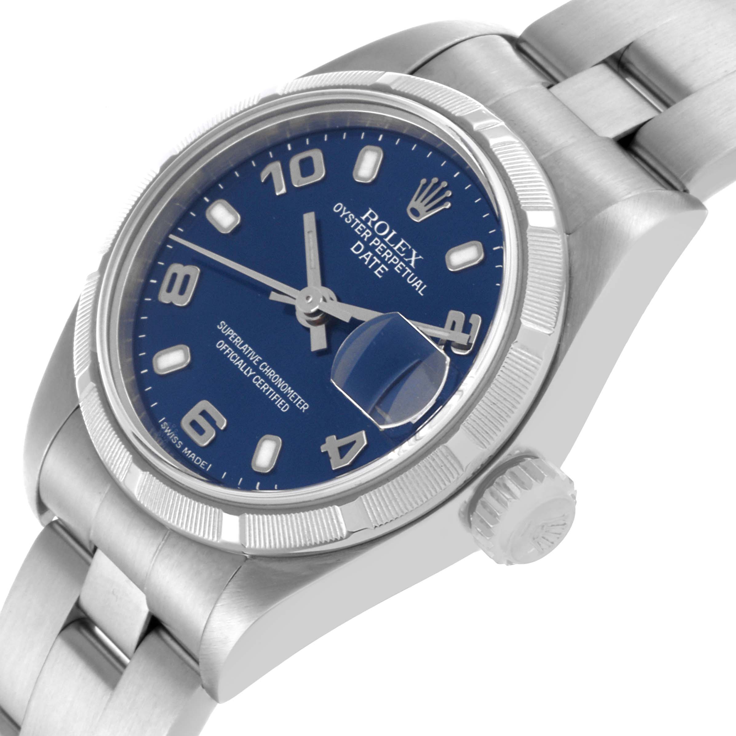 The Rolex Date 79190 Women's Stainless Steel Blue Dial 79190 Women's Stainless Steel Blue Dial watch is viewed from a side angle, showing the dial, bezel, and part of the stainless steel bracelet.
