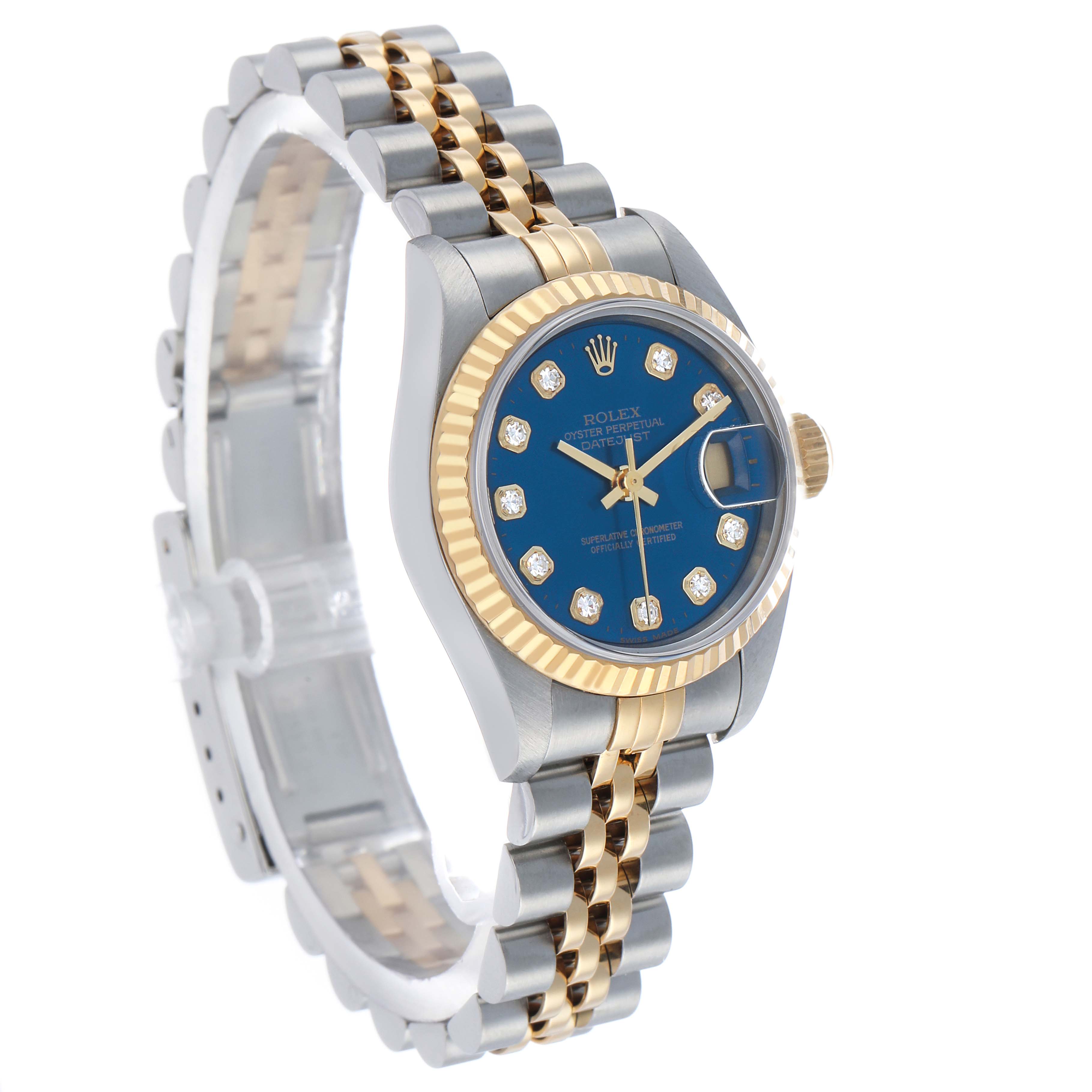The Rolex Datejust 69173 Women's Steel and Gold (two tone) Blue Dial watch is shown at a three-quarter angle, highlighting the blue dial, gold bezel, and two-tone bracelet.