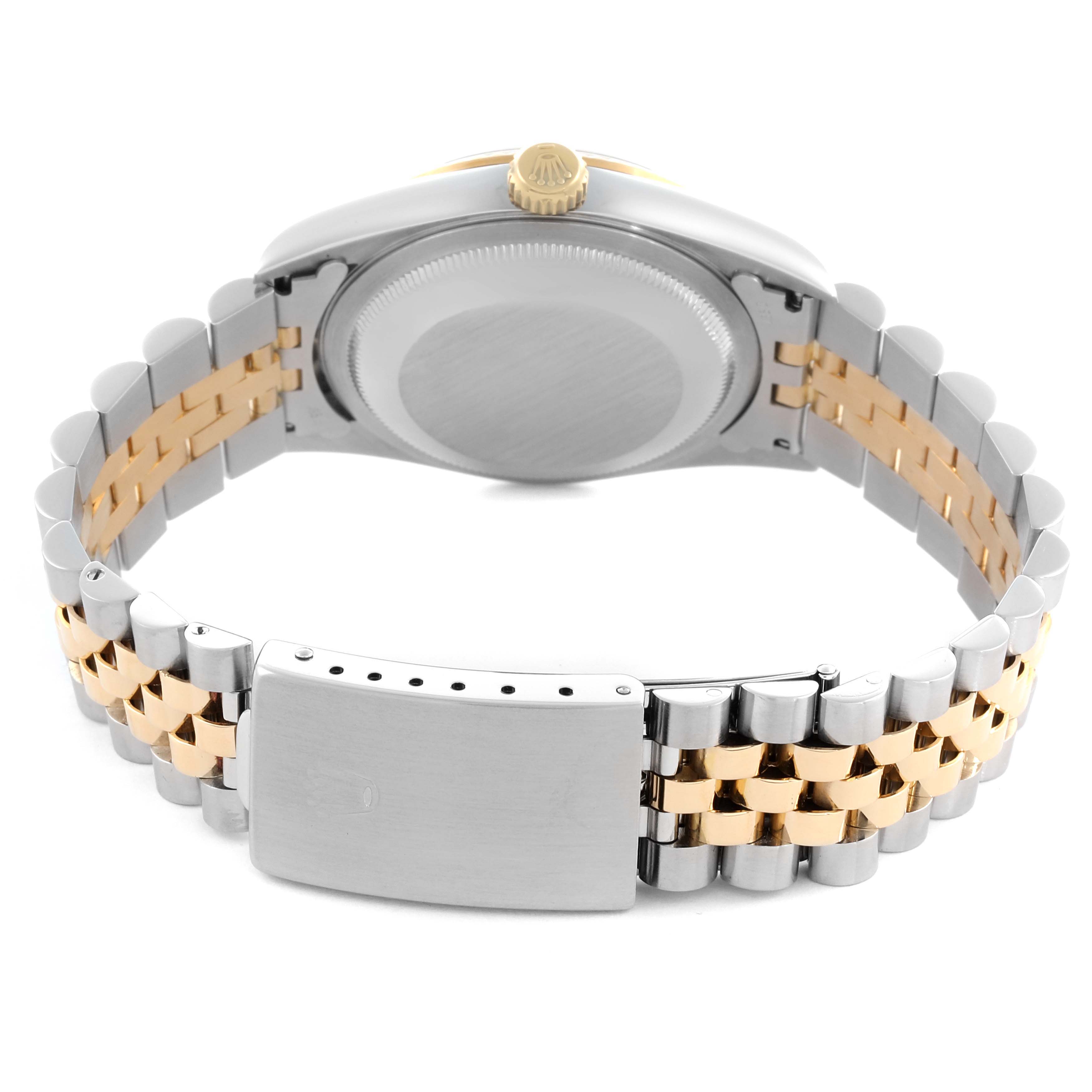 The image shows the backside of a Rolex Datejust 16233 Men's Steel and Gold (two tone) Black Dial 16233 Men's Steel and Gold (two tone) Black Dial watch, highlighting the case back and two-tone bracelet with clasp.