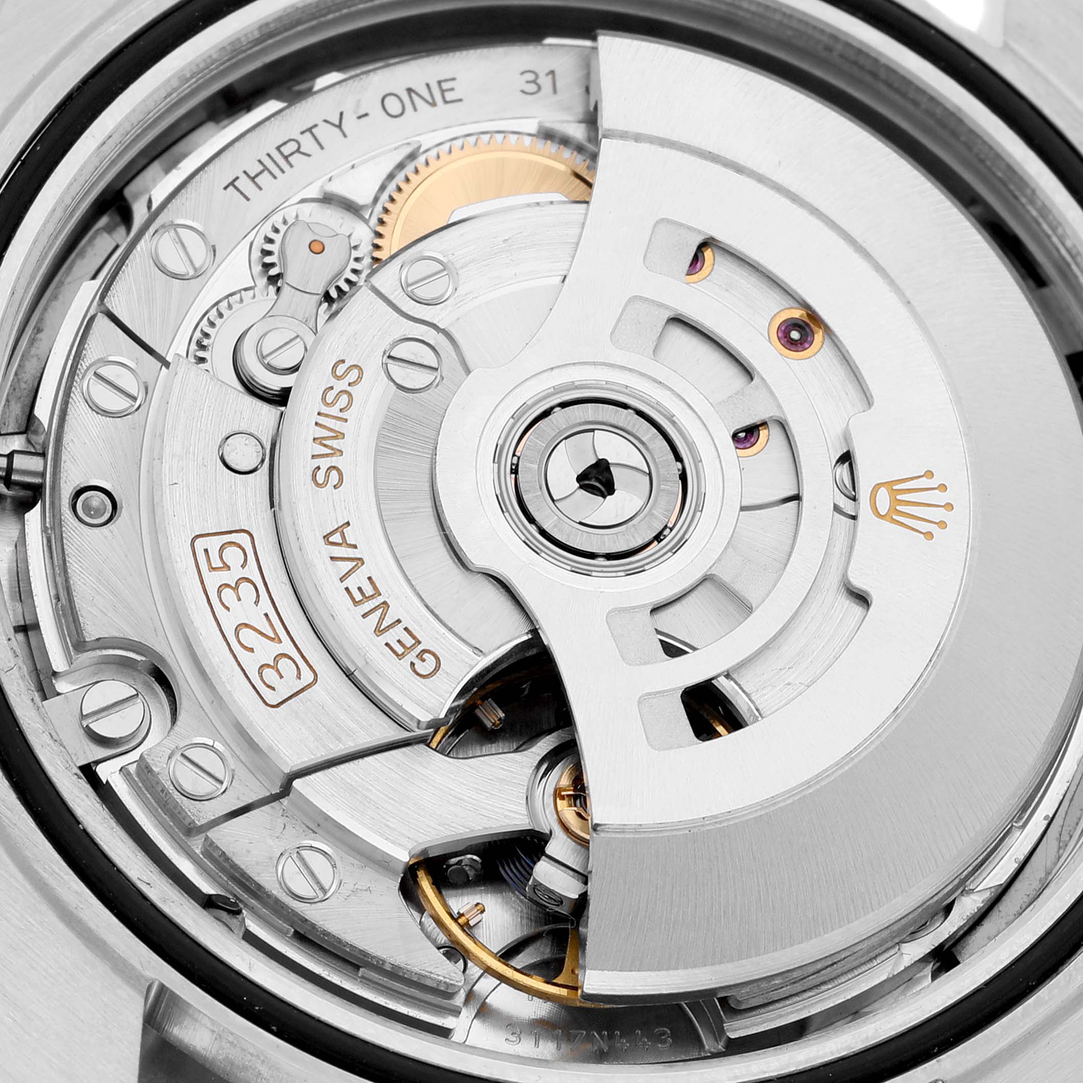 The image shows a close-up view of the Rolex Datejust 41 126300 Men
s Stainless Steel Grey Dial 126300 Men
s Stainless Steel Grey Dial movement, specifically the Caliber 3235 automatic mechanism.