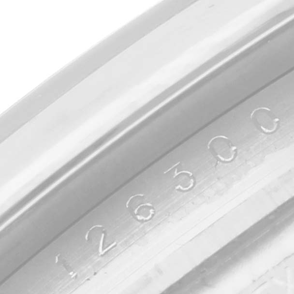 This image shows a close-up of the serial number engraved on the inner bezel of a Rolex Datejust 41 126300 Men
s Stainless Steel Grey Dial 126300 Men
s Stainless Steel Grey Dial watch.