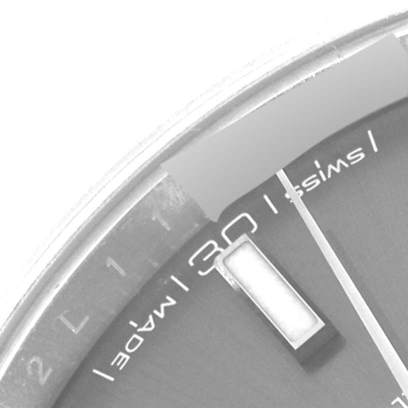 The image shows a close-up of the dial of a Rolex Datejust 41 126300 Men
s Stainless Steel Grey Dial 126300 Men
s Stainless Steel Grey Dial watch, highlighting the 30-minute marker and part of the minute hand.