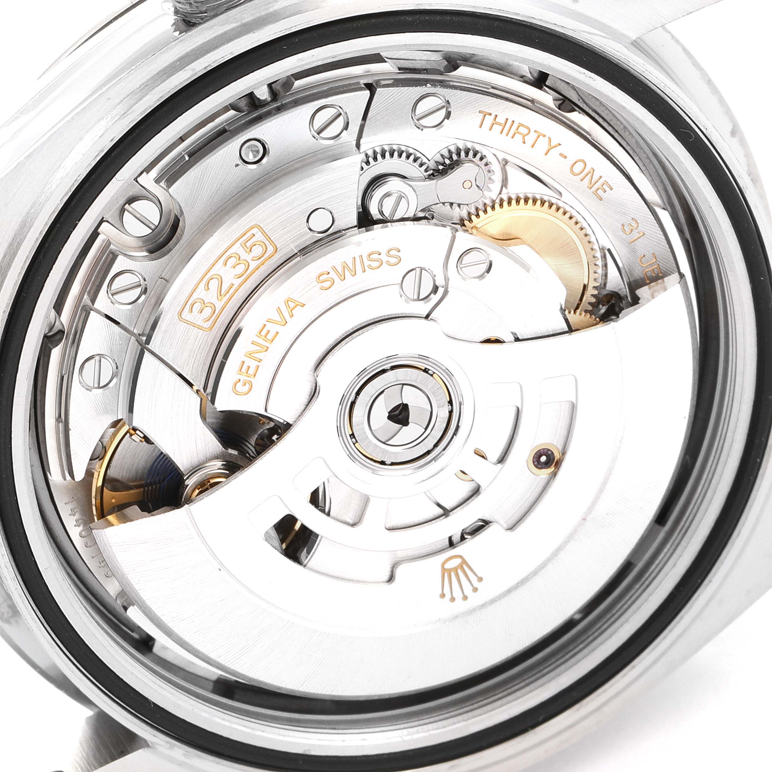 This image shows the inner mechanical movement of the Rolex Datejust 41 126334 Men's Stainless Steel Blue Dial 126334 Men's Stainless Steel Blue Dial watch, displaying its intricate components and engravings.