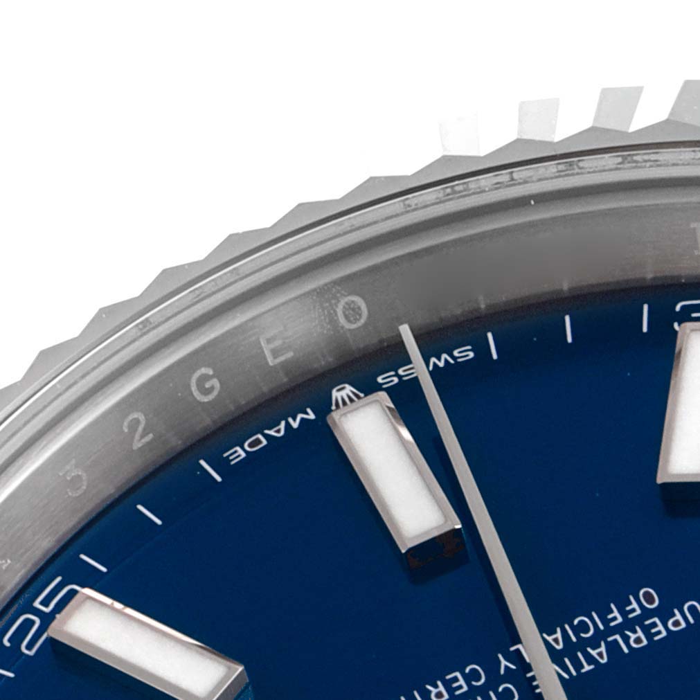 This image shows a close-up of the bezel and blue dial of a Rolex Datejust 41 126334 Men's Stainless Steel Blue Dial 126334 Men's Stainless Steel Blue Dial watch.