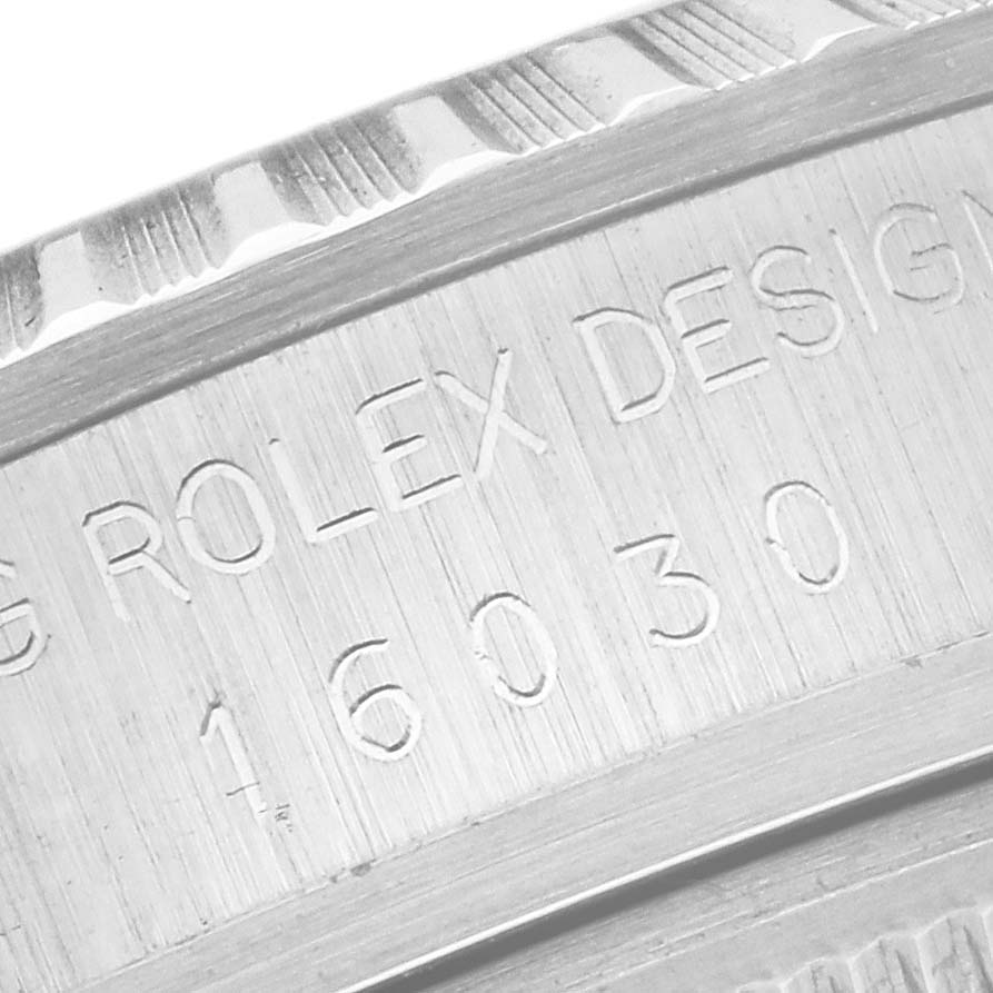 The image shows a close-up of the engraved case back of the Rolex Vintage Collection 16030 Men's Stainless Steel Silver Dial 16030 Men's Stainless Steel Silver Dial model, featuring the design number.