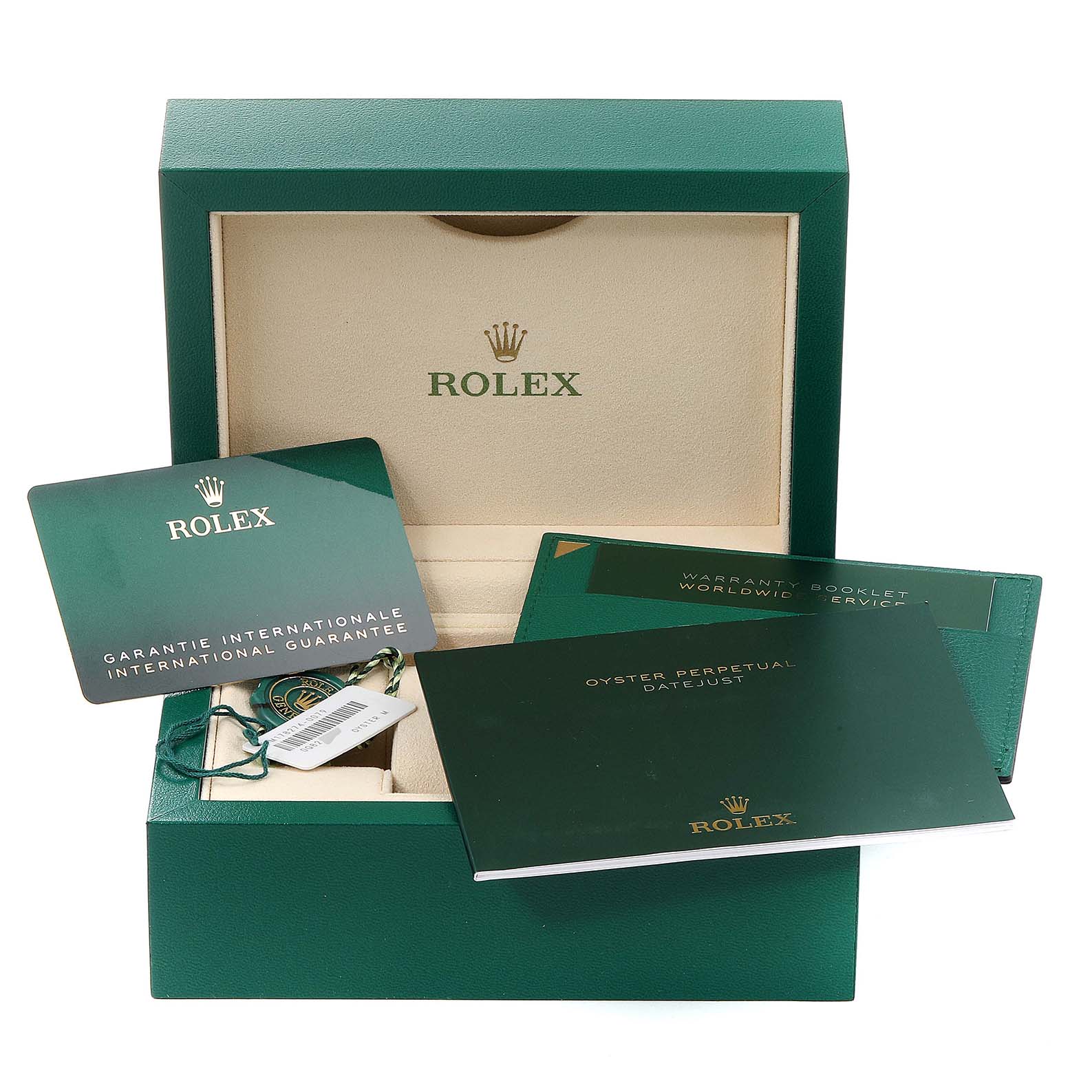 The image shows an open box with accessories for a Mid-Size Rolex watch, including manuals, a warranty card, and a swing tag.