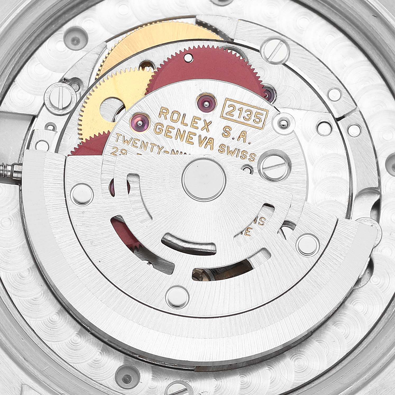 This image shows the movement mechanism of a Mid-Size Rolex watch from a top-down angle.