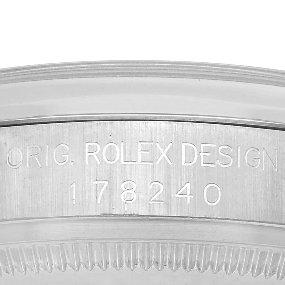 The image shows a close-up of the side of the Rolex Mid-Size 178240 Women's Stainless Steel Black Dial 178240 Women's Stainless Steel Black Dial model 178240, highlighting the engraved model number.