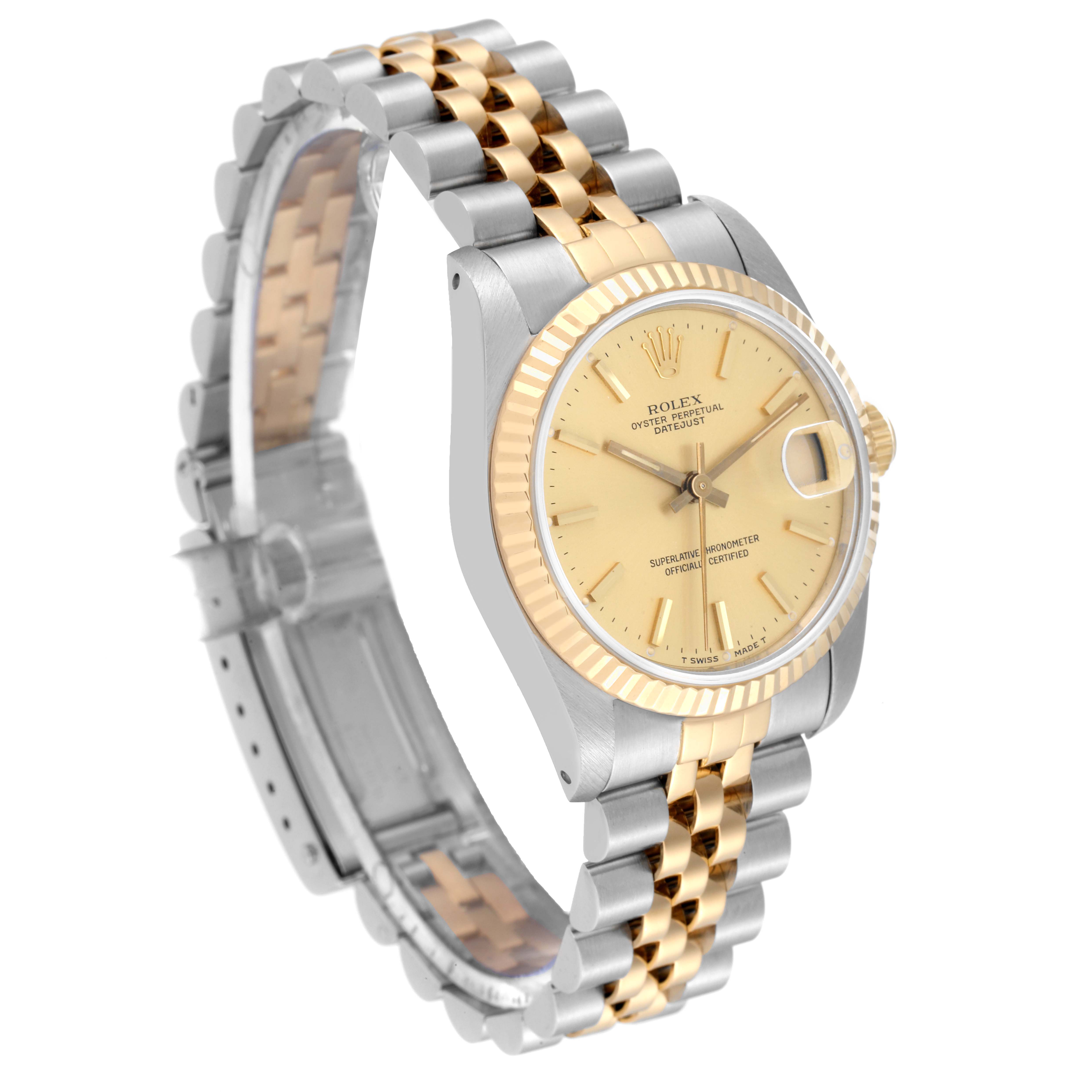 This image shows a side angle of a Rolex Mid-Size 68273 Women
s Steel and Gold (two tone) Champagne Dial 68273 Women
s Steel and Gold (two tone) Champagne Dial Datejust watch, highlighting the face, bezel, and two-tone bracelet.