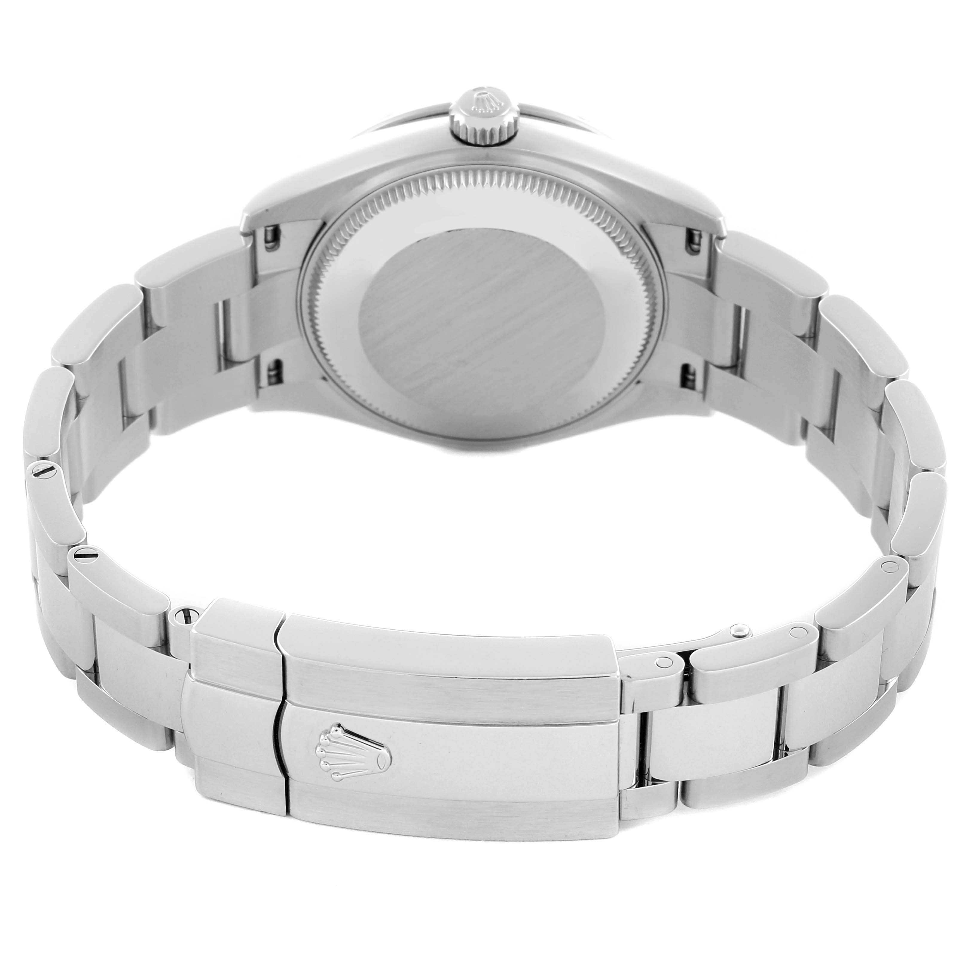 The image shows the back and bracelet of a Mid-Size Rolex watch from a rear angle.