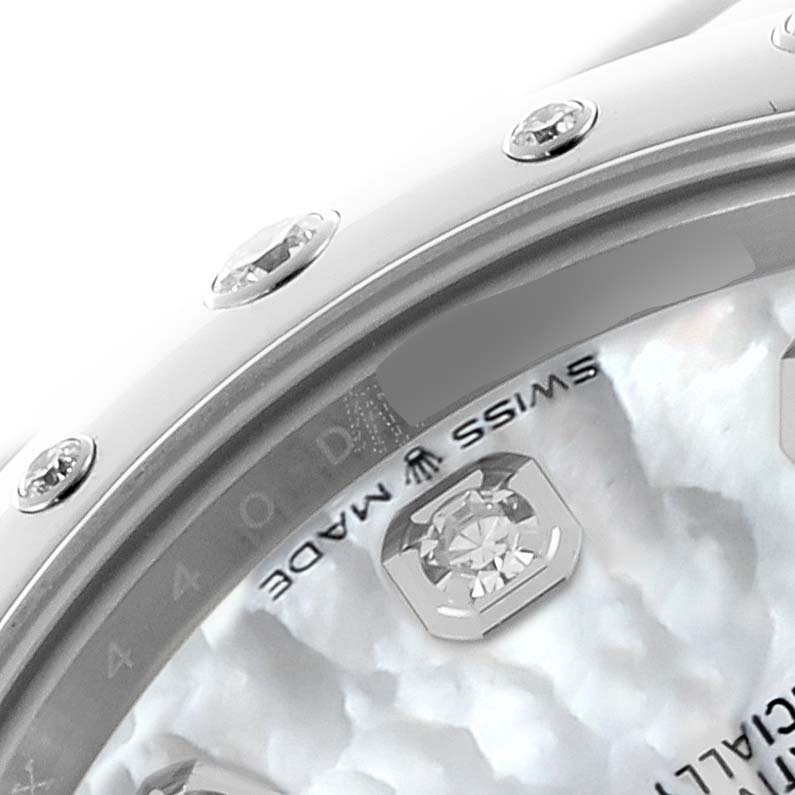 The image shows a close-up of the bezel with diamonds and part of the dial of the Rolex Mid-Size 278344RBR Women's Stainless Steel Mother of Pearl Dial 278344RBR Women's Stainless Steel Mother of Pearl Dial watch.