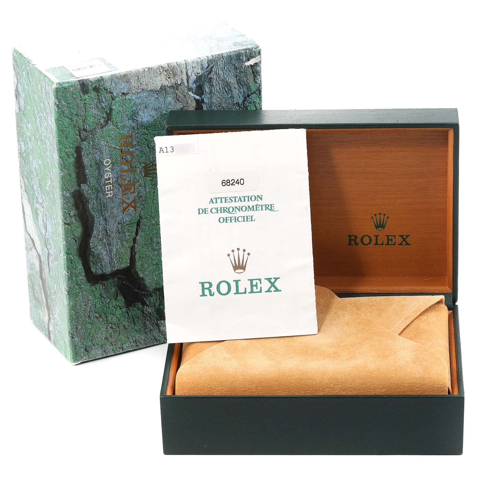 The image shows Rolex packaging with a box, green book, and paperwork for a Mid-Size model, with the outer box displaying a marble-like pattern.