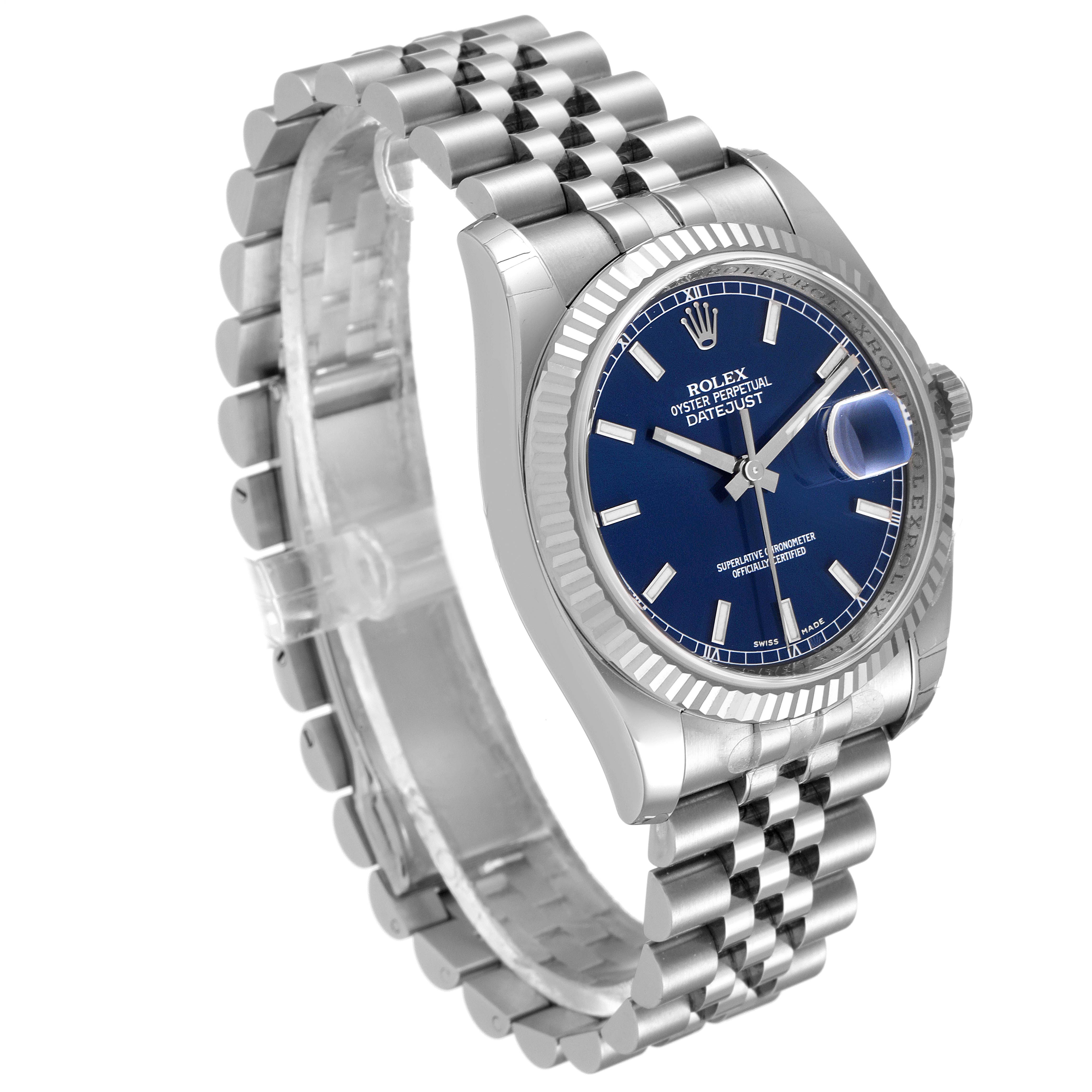 The image shows a Rolex Datejust 116234 Men's Stainless Steel Blue Dial 116234 Men's Stainless Steel Blue Dial watch at a three-quarter angle, highlighting the blue dial, fluted bezel, and Jubilee bracelet.