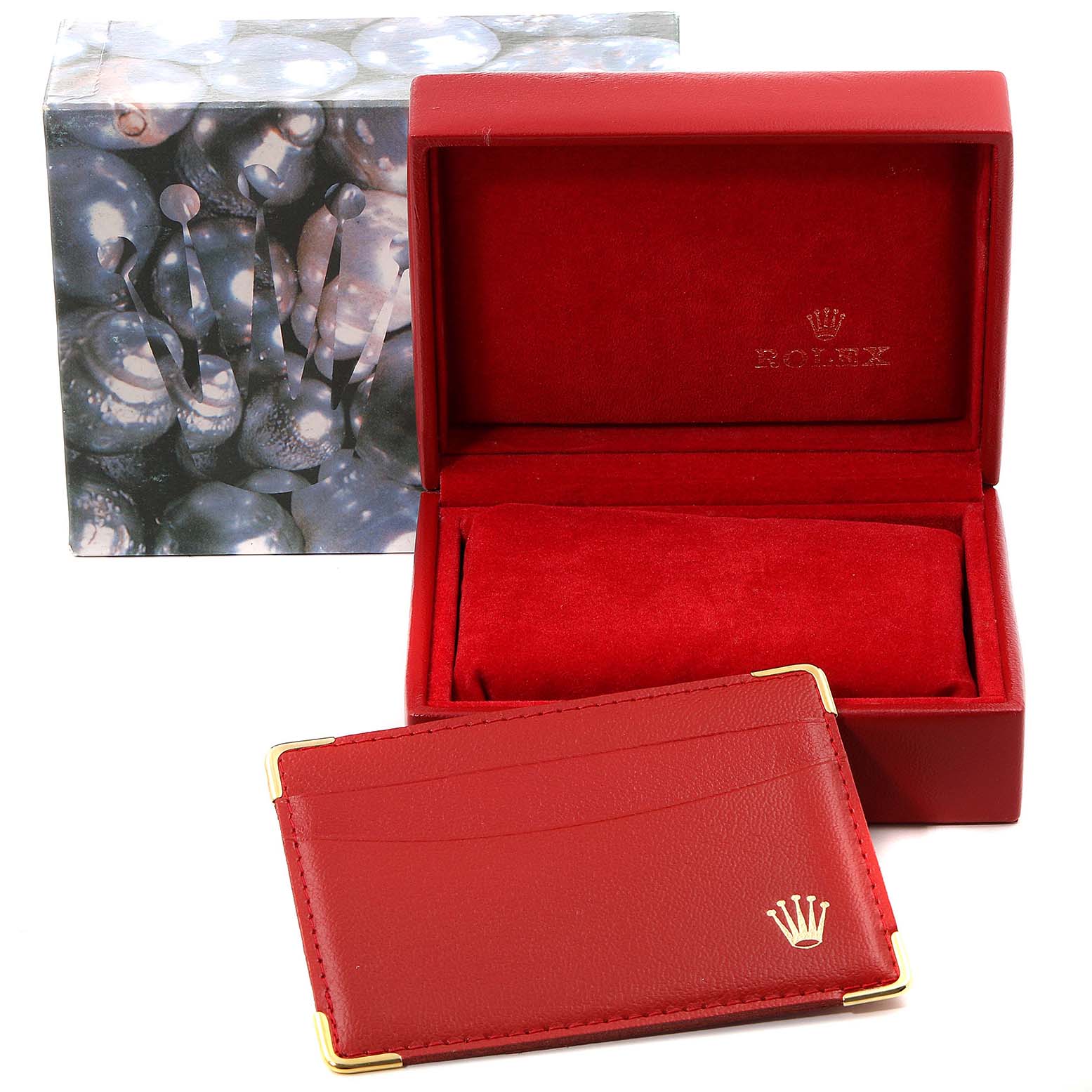 This image shows a Rolex Datejust 69174 Women's Stainless Steel Mother of Pearl Dial 69174 Women's Stainless Steel Mother of Pearl Dial watch's empty red presentation box and cardholder, alongside the outer packaging.