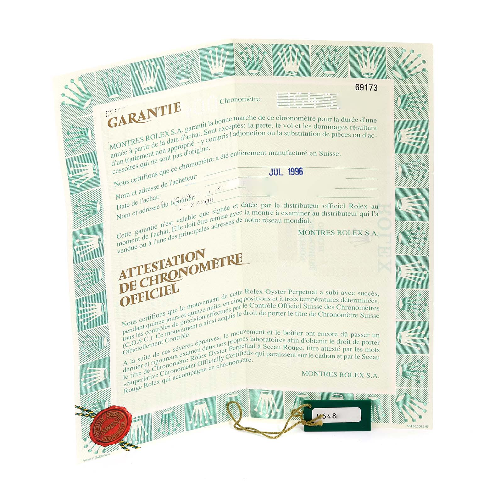The image shows the warranty and certification papers for the Rolex Datejust 69173 Women's Steel and Gold (two tone) Champagne Dial 69173 Women's Steel and Gold (two tone) Champagne Dial, with a serial tag.