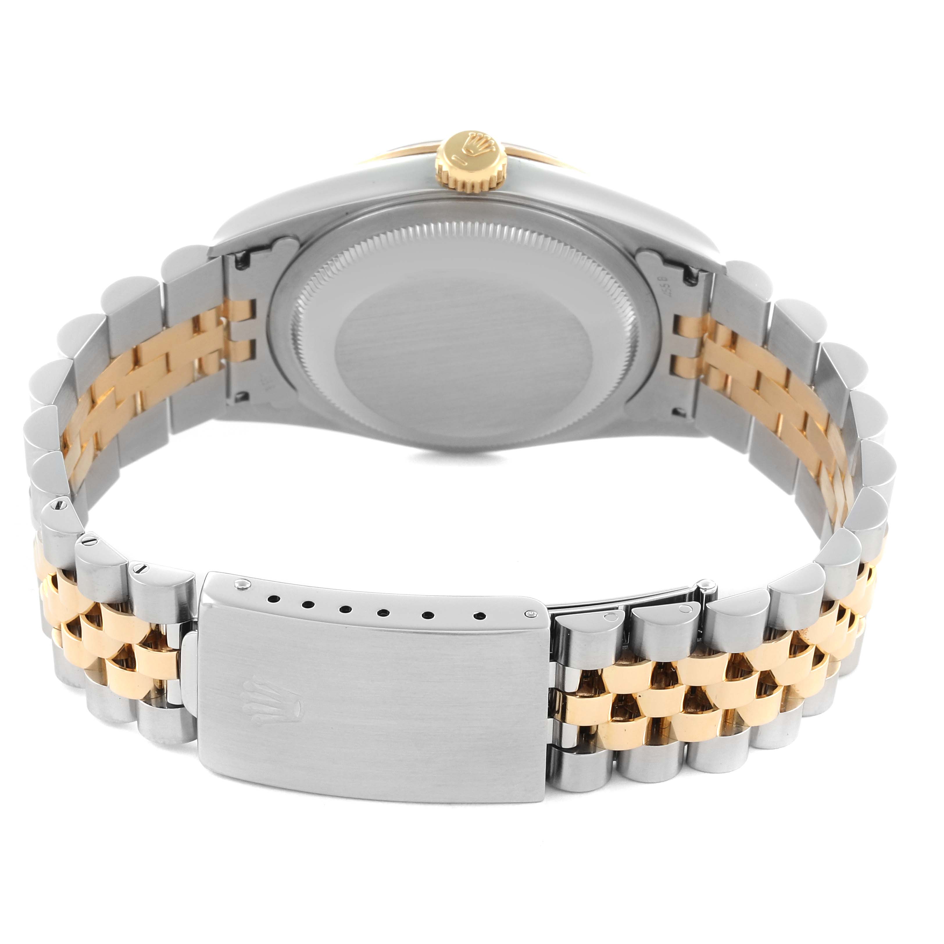 The image shows the back of a Rolex Datejust 16233 Men
s Steel and Gold (two tone) Champagne Dial 16233 Men
s Steel and Gold (two tone) Champagne Dial watch, focusing on the case, crown, and two-tone bracelet with the clasp.