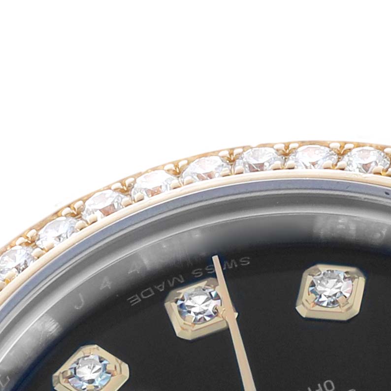 The image shows a close-up of the bezel and part of the dial with diamond markers on a Rolex Datejust 179383 Women's Stainless Steel Black Dial watch.