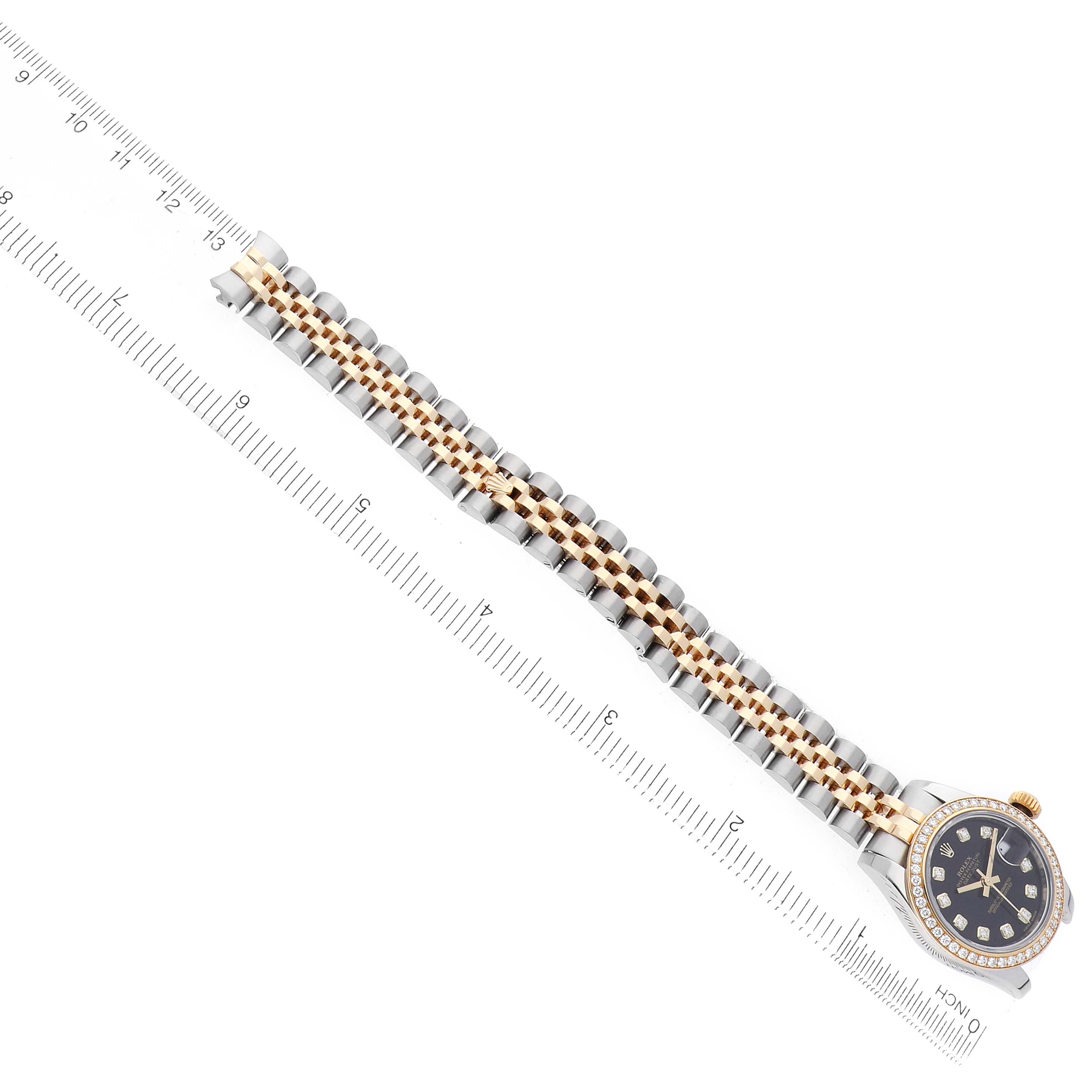 The Rolex Datejust 179383 Women's Stainless Steel Black Dial watch is shown from a top angle with its bracelet and a partial view of the dial and bezel.