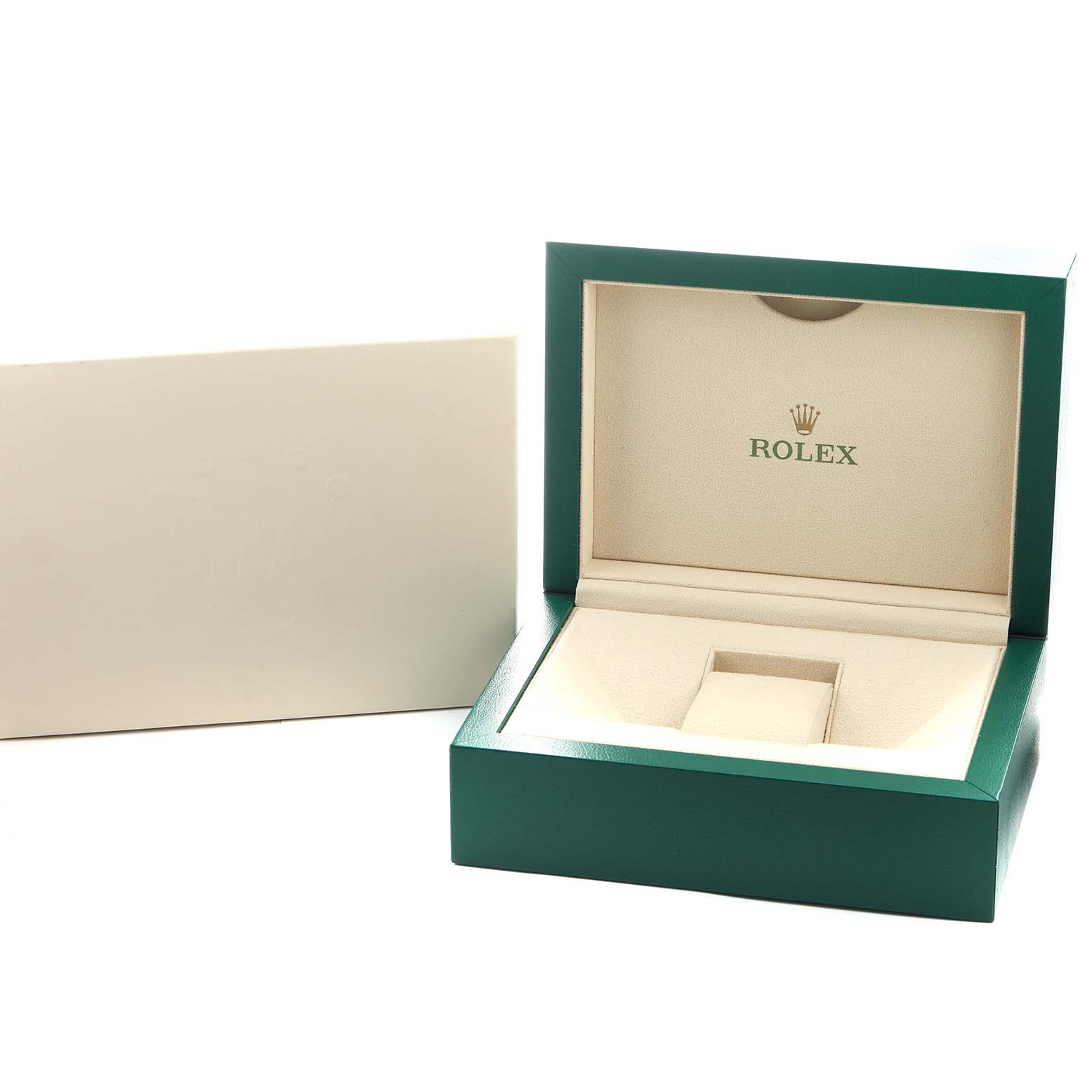 The image shows an open green and beige Rolex box designed for the President model watch, shot from a front angle.
