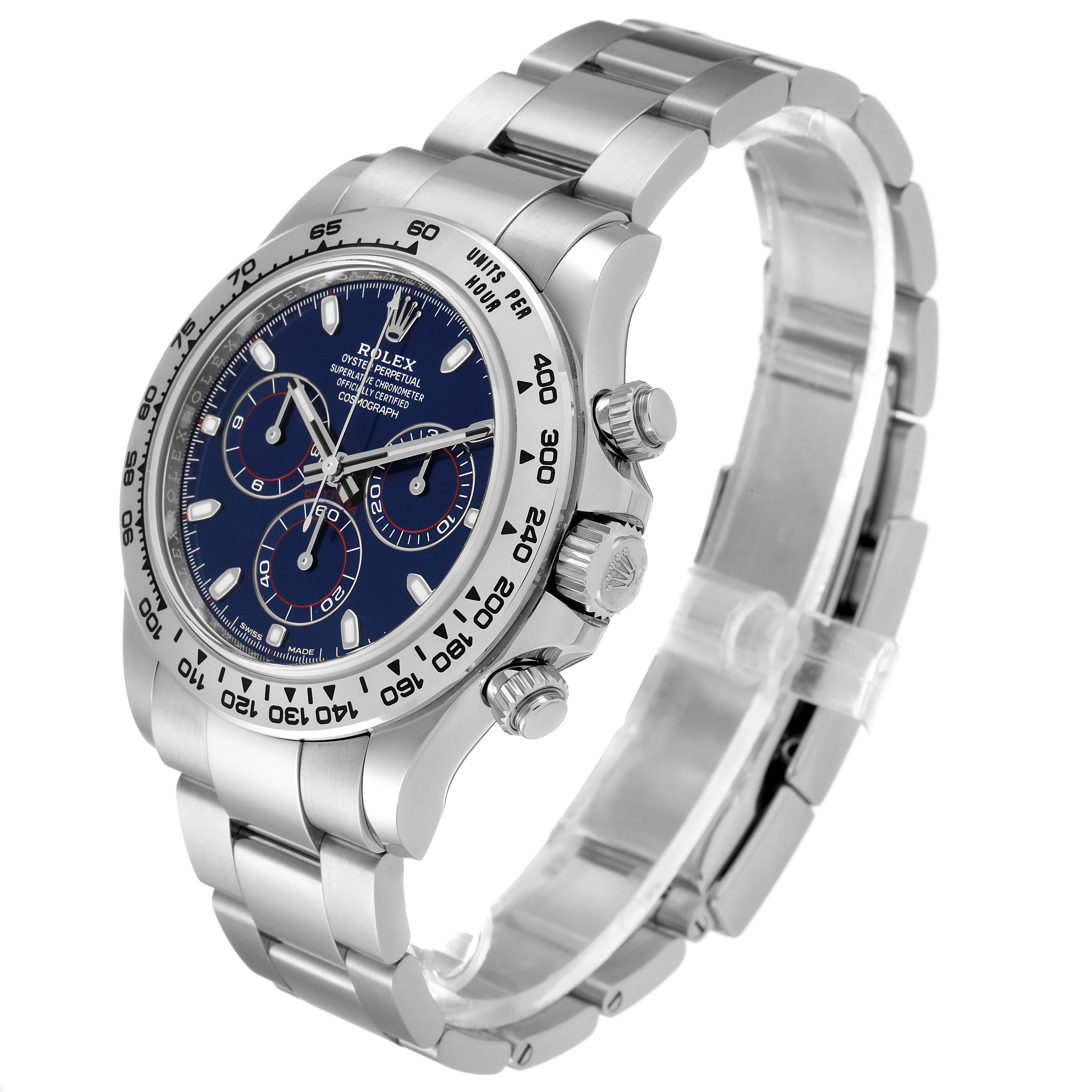 The image shows a side and front angle of a Rolex Daytona 116509 Men's White Gold Blue Dial 116509 Men's White Gold Blue Dial watch, highlighting the face, bezel, and bracelet.