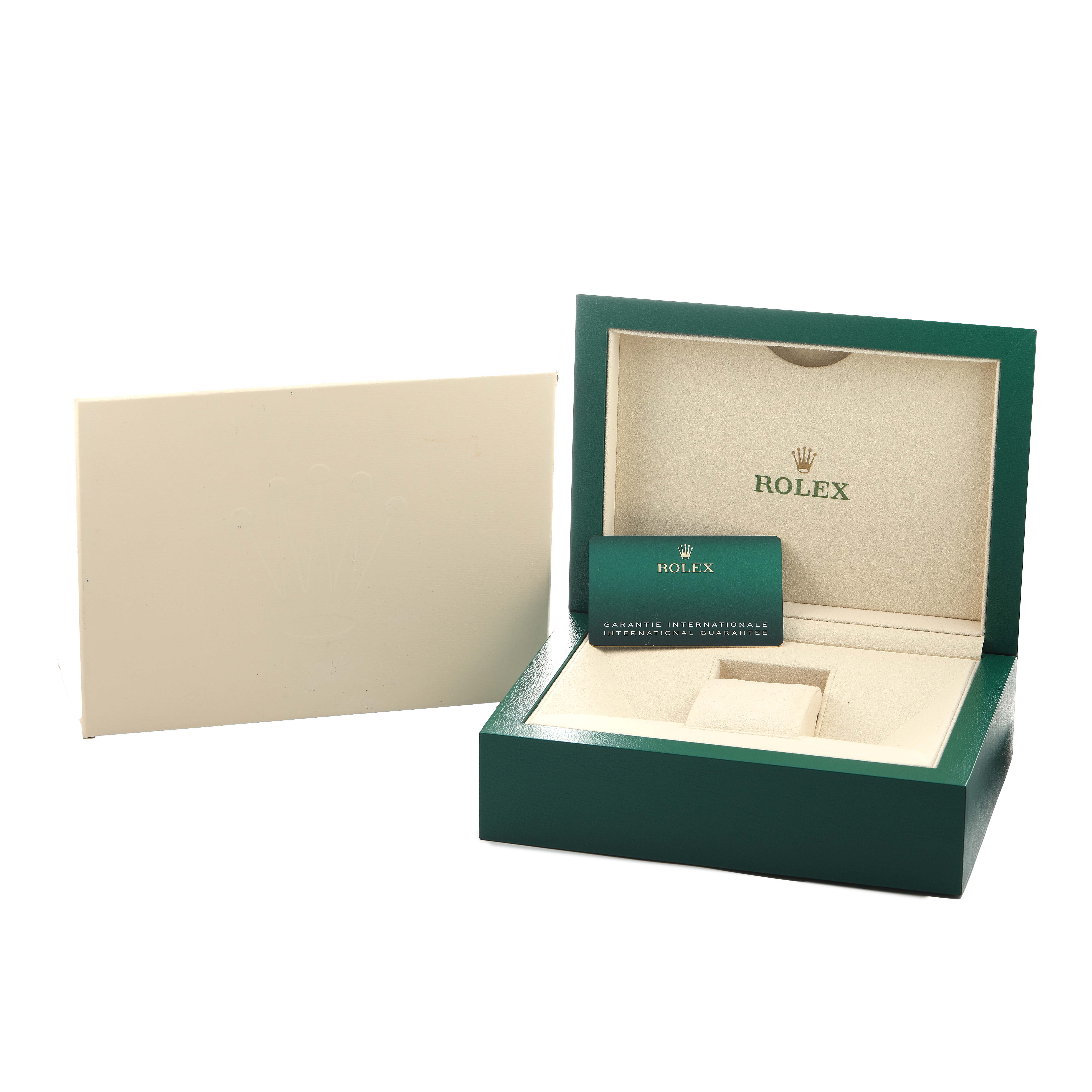 The image shows an open Rolex GMT-Master 126710 Men's Stainless Steel Black Dial box with a warranty card and a green outer case at an angled view.