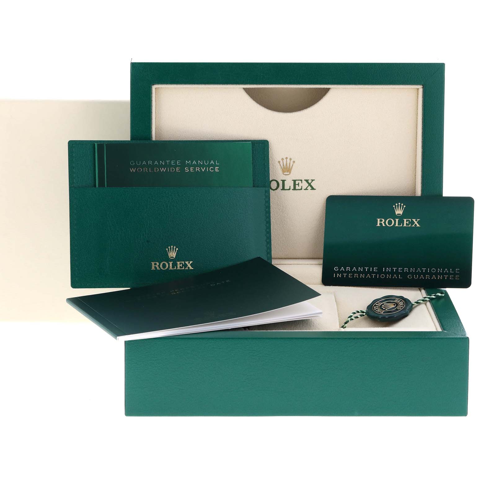 The image shows the packaging, guarantee manual, international guarantee card, and accessories for the Rolex Oyster Perpetual 124300 Men
s Stainless Steel Blue Dial 124300 Men
s Stainless Steel Blue Dial model.