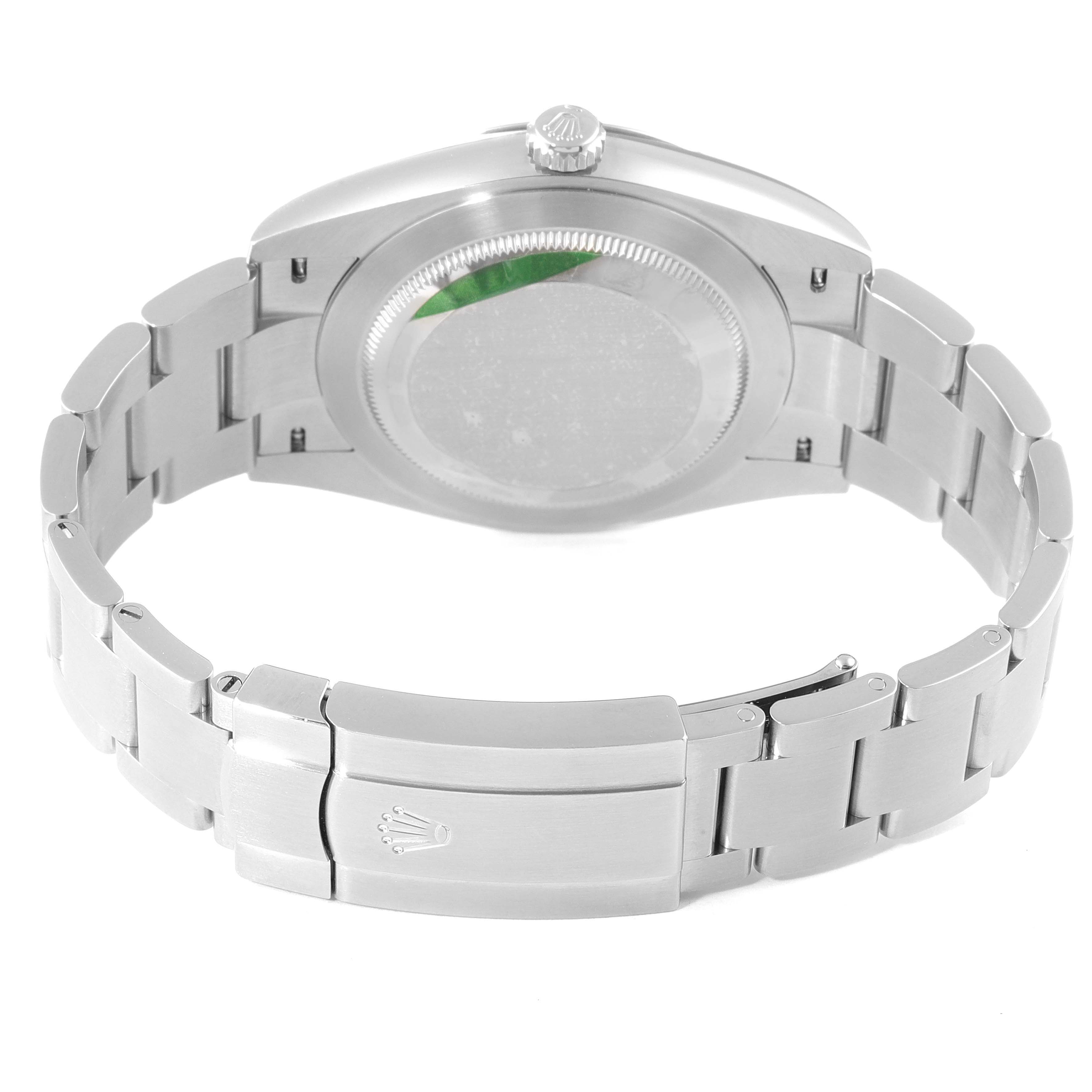 This image shows the backside and bracelet of a Rolex Oyster Perpetual 124300 Men
s Stainless Steel Blue Dial 124300 Men
s Stainless Steel Blue Dial watch.