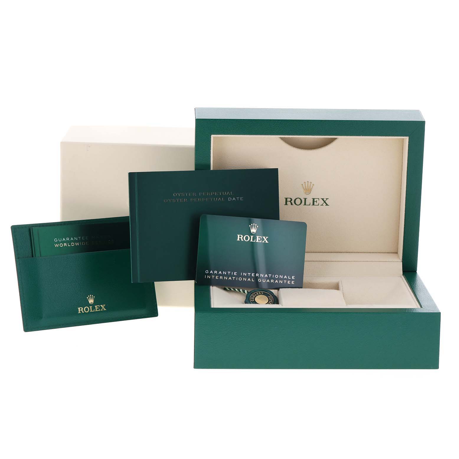 This image shows the packaging, guarantee card, and information booklets for a Rolex Oyster Perpetual 126000 Men
s Stainless Steel Black Dial 126000 Men
s Stainless Steel Black Dial watch.