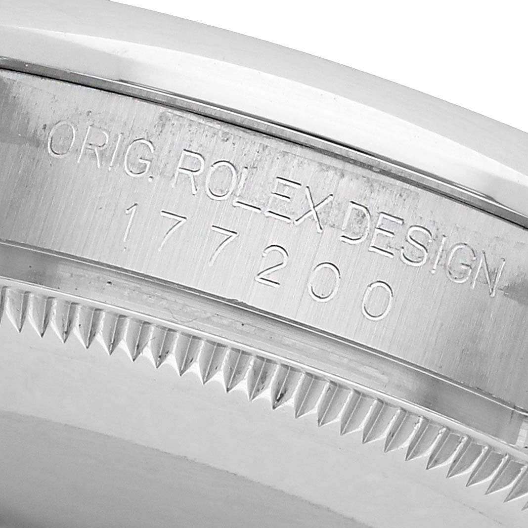 The image shows the side engraving of a mid-size Rolex Model 177200, focusing on the case's edge and engravings.