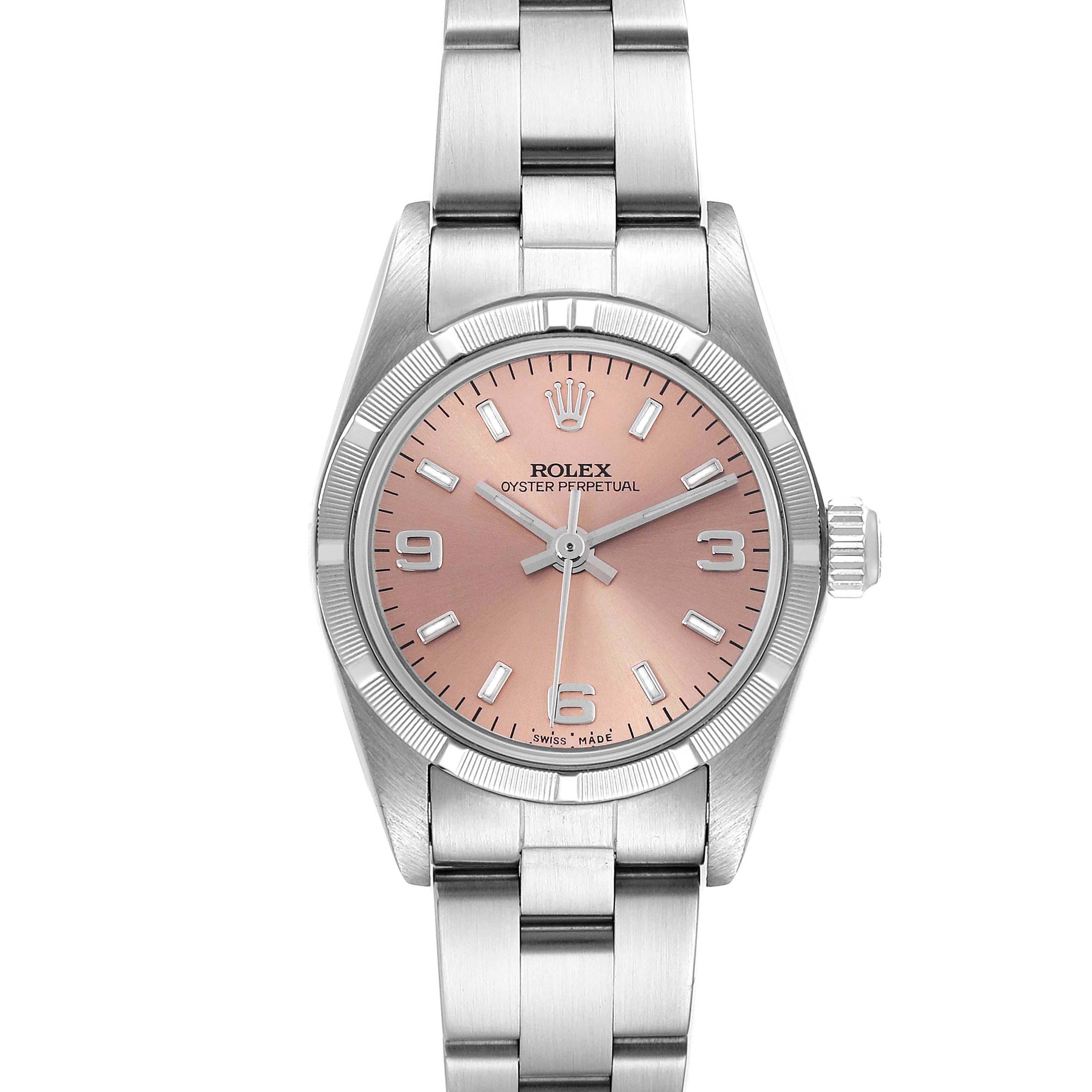 The Rolex Oyster Perpetual 76030 Women's Stainless Steel Pink Dial 76030 Women's Stainless Steel Pink Dial watch is shown from a top-down angle, displaying the full dial, bezel, and part of the bracelet.