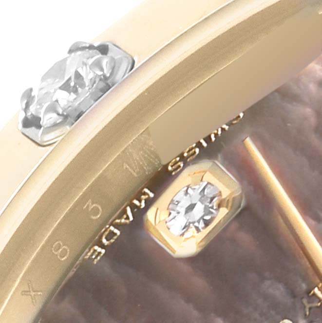 The image shows a close-up of a Rolex Pearlmaster 81318 Women's Yellow Gold Mother of Pearl Dial watch, highlighting the bezel with diamond details and part of the dial.